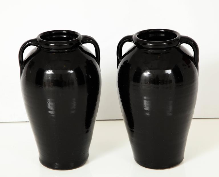 Pair of Tall Black Glazed Stone Ware Vases or Jars with Handles For Sale at 1stdibs
