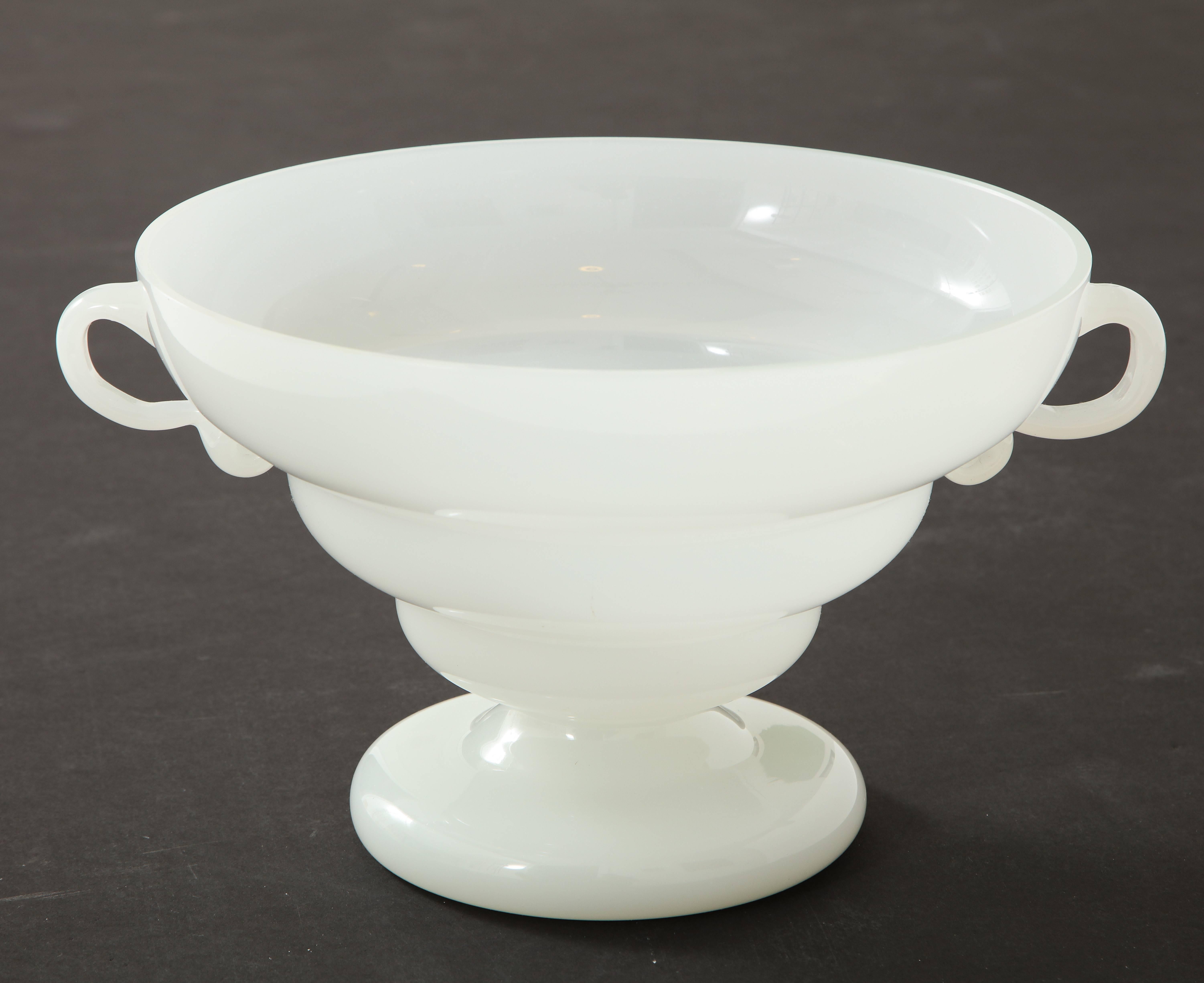 A very delicate and Fine Italian 1930s opaline glass bowl with graduated centre stem and circular base support, with handles on both sides.
Italy, circa 1930
Size: 8