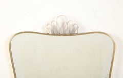 Luigi Fontana 1940's Brass Shaped Wall Mirror with Decorative Scroll Crest