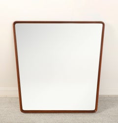 Gio Ponti (1891-1979), Att. for Production Dassi Walnut Wall Mirror, circa 1950.