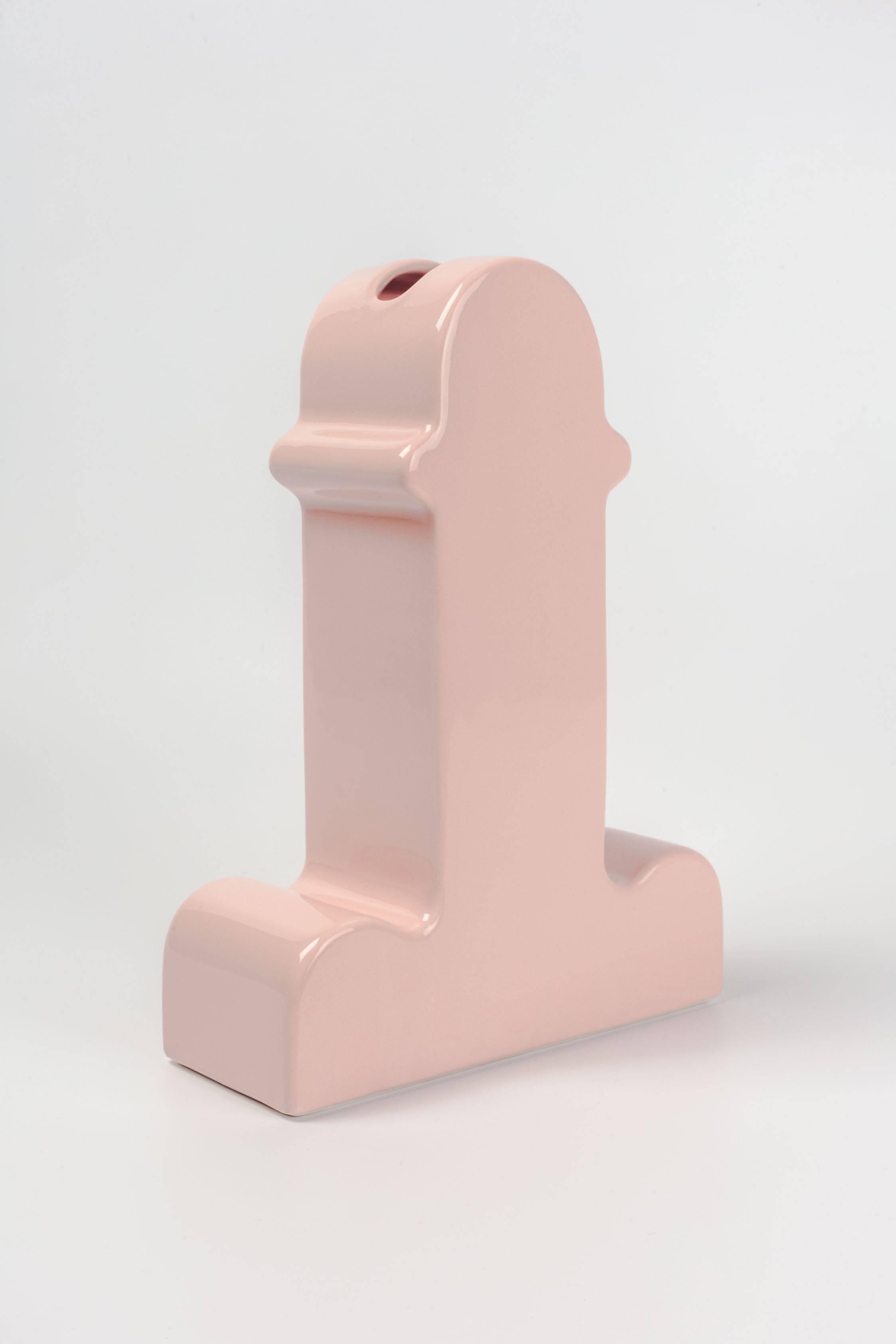 An iconic pink Memphis vase in the shape of the penis from the Postmodern master, Ettore Sottsass. Such an icon, Terry Richardson pictured it with red tulips on his blog in 2010. Designed for B.D. Barcelona in 1973. Pink glazed ceramic. A