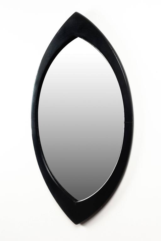 Swedish Mirror By Hans Agne Jakobsson With Black Oval Beveled Wood Swedish Mirror By Hans Agne Jakobsson With Black Oval Beveled Wood Frame 1950s In Excellent