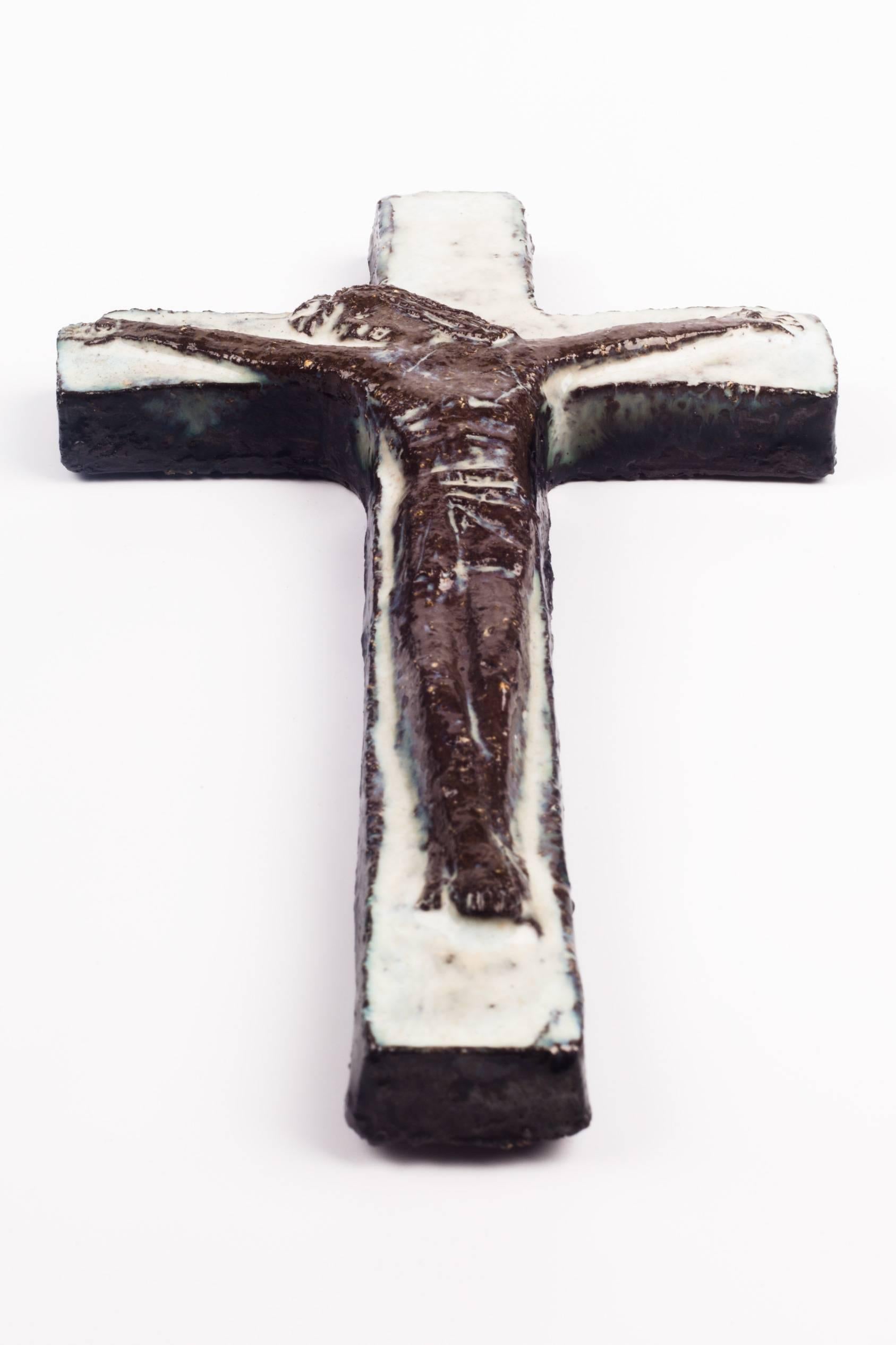 white wall crucifix