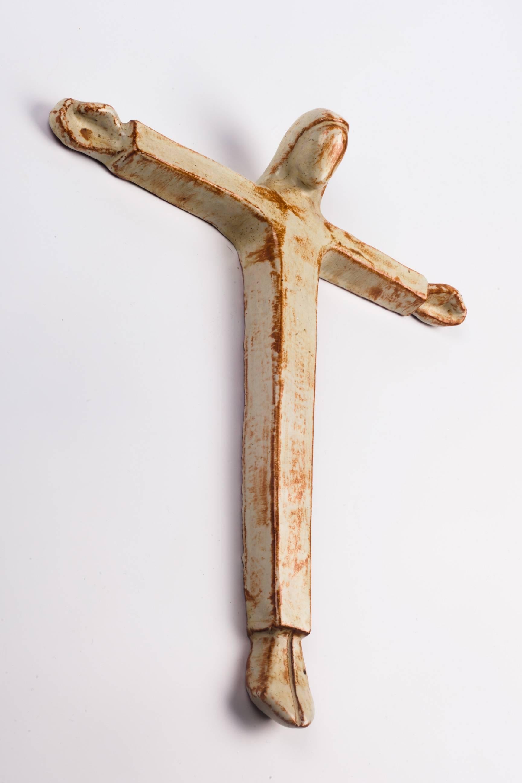 white wall crucifix