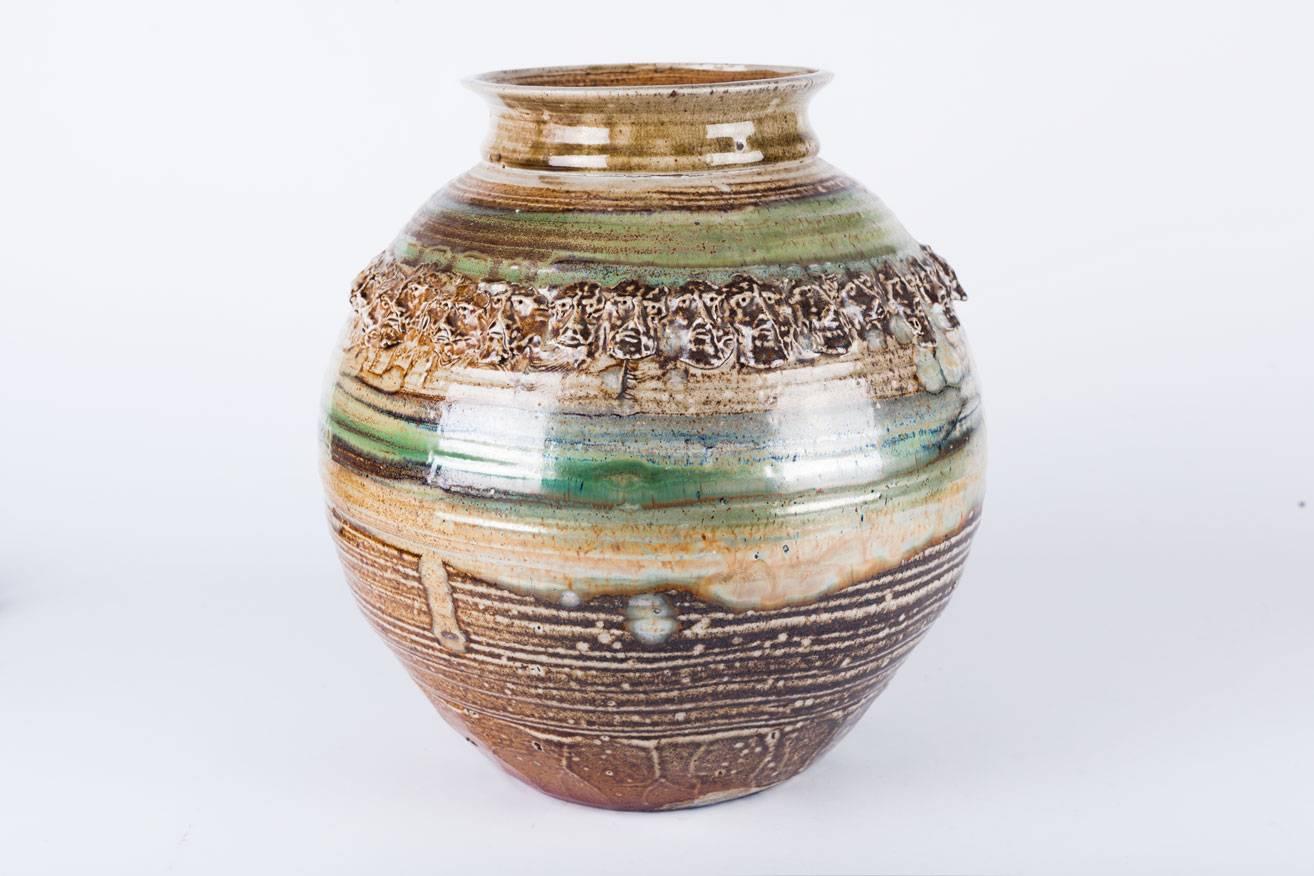 Late 20th Century Raku Vessel by Phil Mundt, Hearth Tones and Green Blue, Faces Crown Detail, 1970