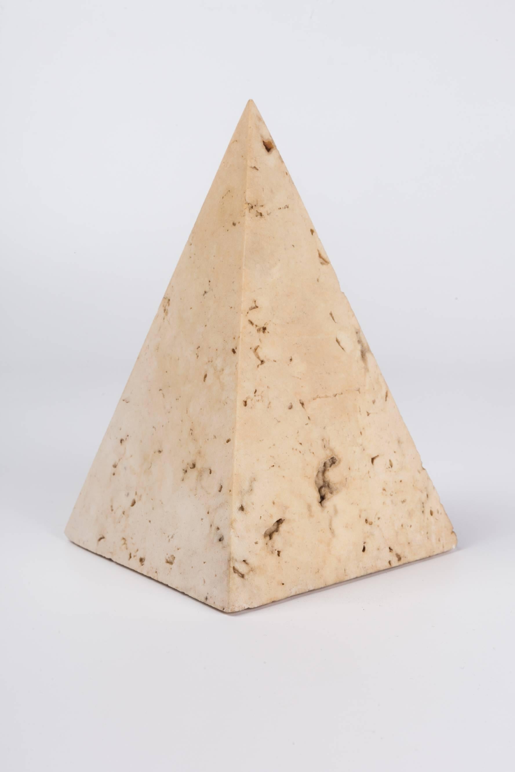 Pyramid paperweight or decorative object made of neutral cream travertine marble. Made in Italy in the 1970s.