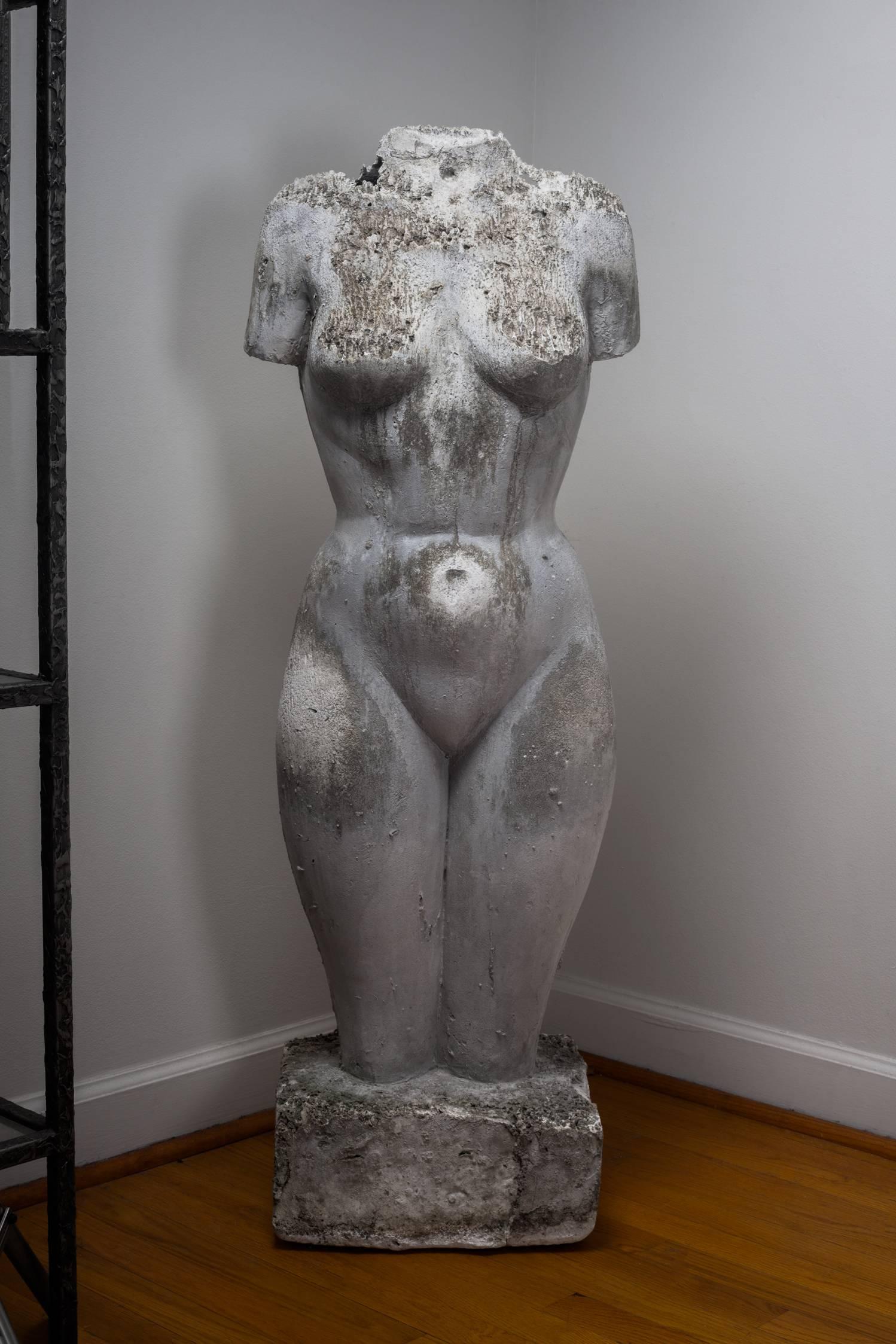 Nude female torso sculpture and large outsider art piece. Aged naturally outside the artist's atelier, this piece is one of a kind, the personal work of an artisan potter.