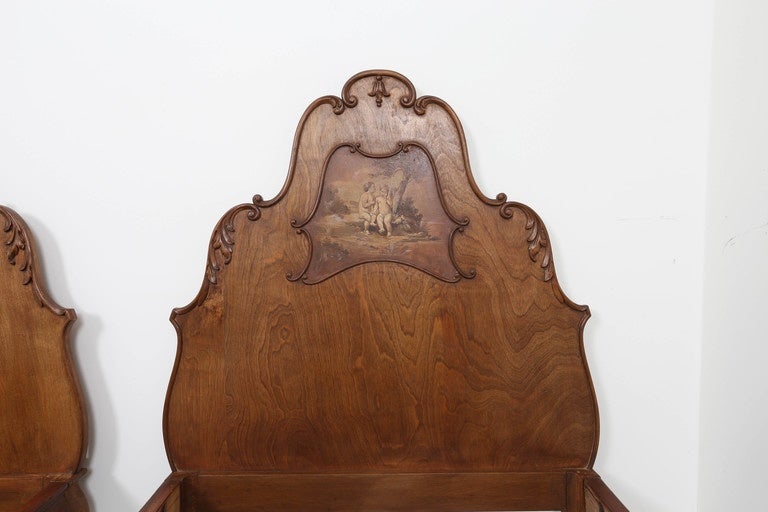 Walnut Head & Foot Boards with hand painted romantic cherubs within applied scroll molding cartouche. Head board 52