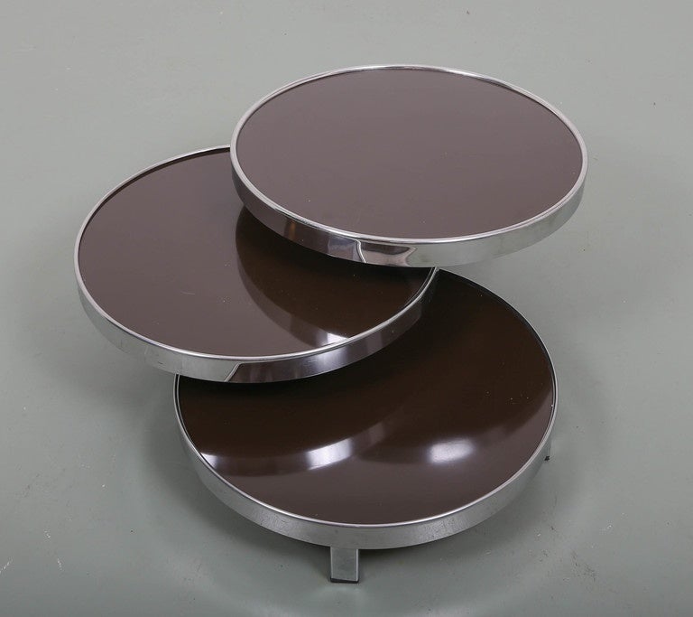 3 tiered chocolate brown and chrome table. Could easily be used as a coffee or side table.