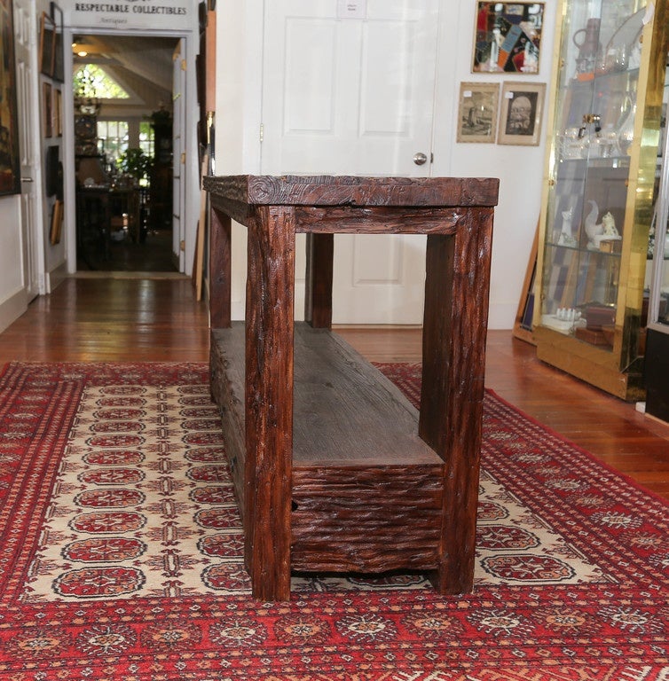 Made from recycled teak this rustic console is great looking and has three front storage drawers. Made in Bali.