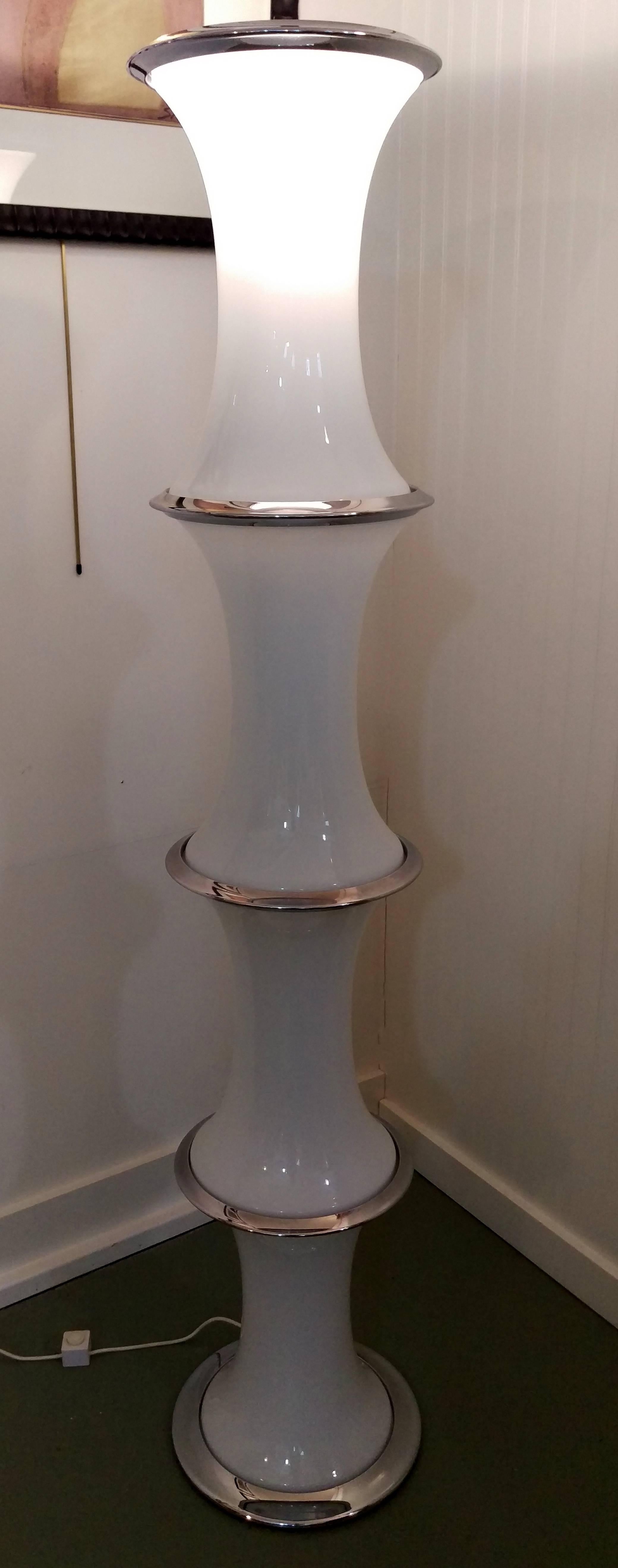 Rarely found four Murano glass sculptural floor lamp by Enrico Tronconi for Vistosi. It is in exceptional original condition with very minor wear. It has three settings for the light, bottom section, top or all nine bulbs please see pictures. It