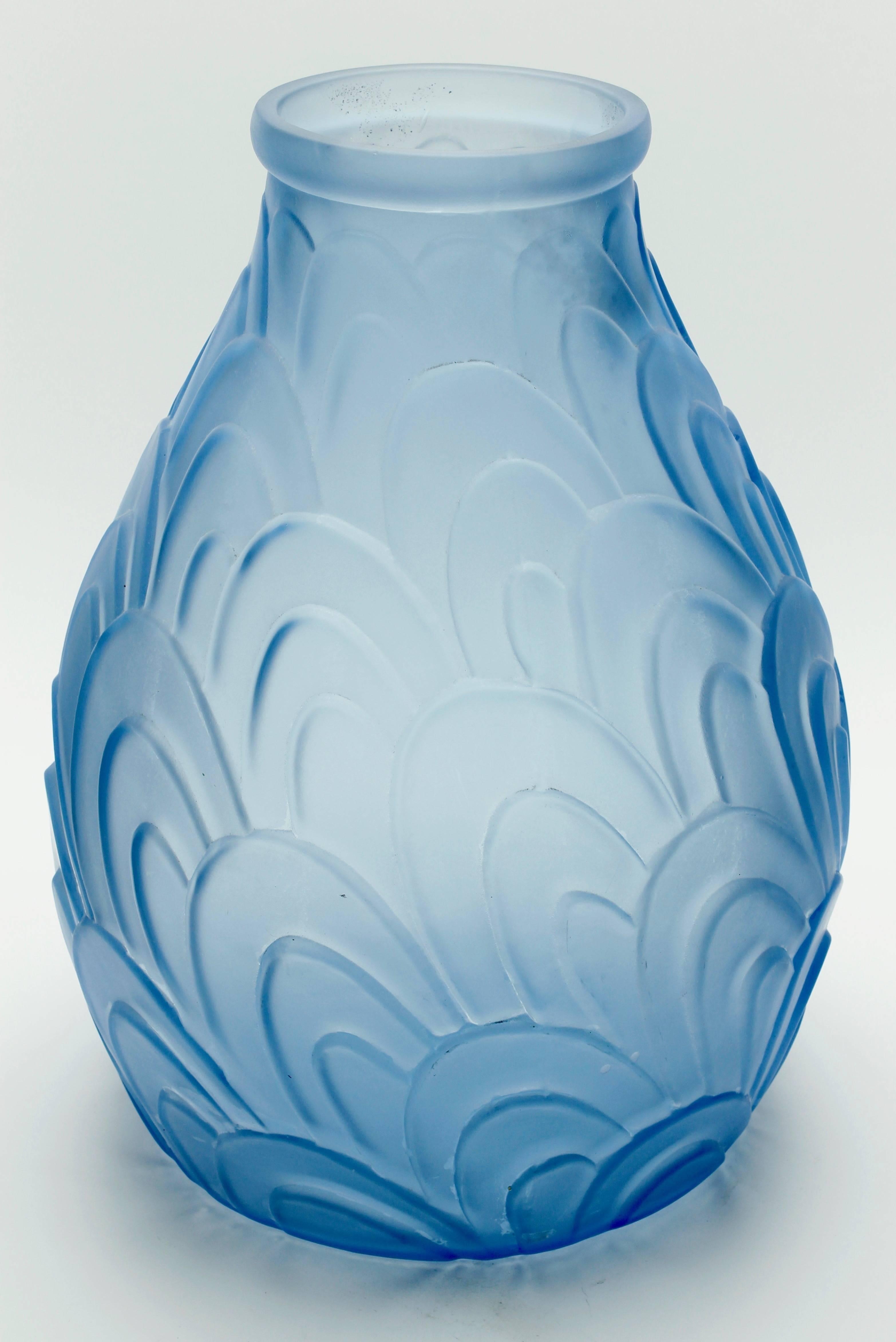 Art Deco vase, made of light-blue frosted pressed glass,

circa 1930, France, made of pressed glass, signed Sars, France
In good condition, with minor signs of wear. 

Measures: Height 30 cm and diameter 22 cm. Light-blue.
 