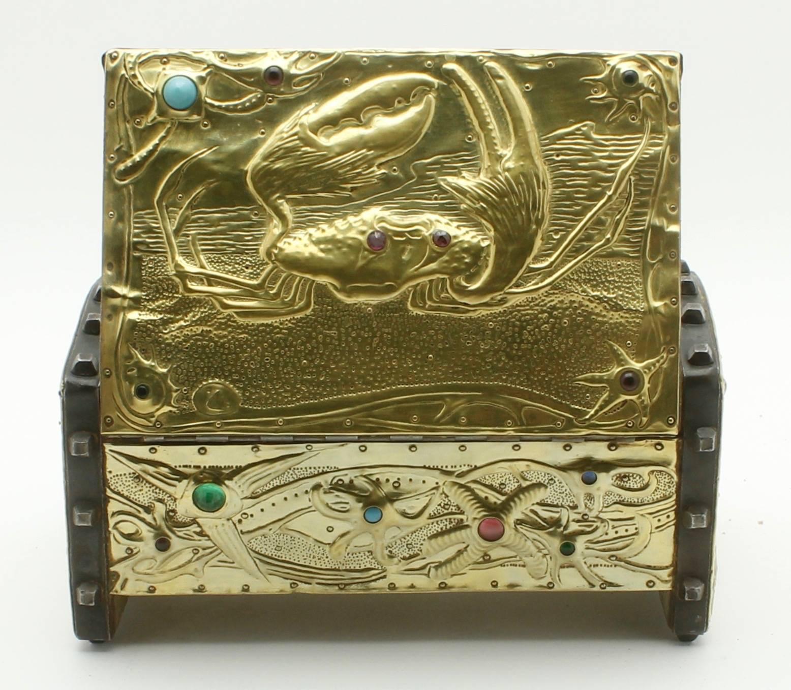 Alfred-Louis-Achille Daguet
Crab box, circa 1900
Medium:
Design, wood, metal forget, copper hammered with glass cabochons.

Movement:
Art Nouveau

Dimensions
4.1 in H x 8.1 in W x 4.5 in D
10.8 cm H x 20.5 cm W x 11.5 cm