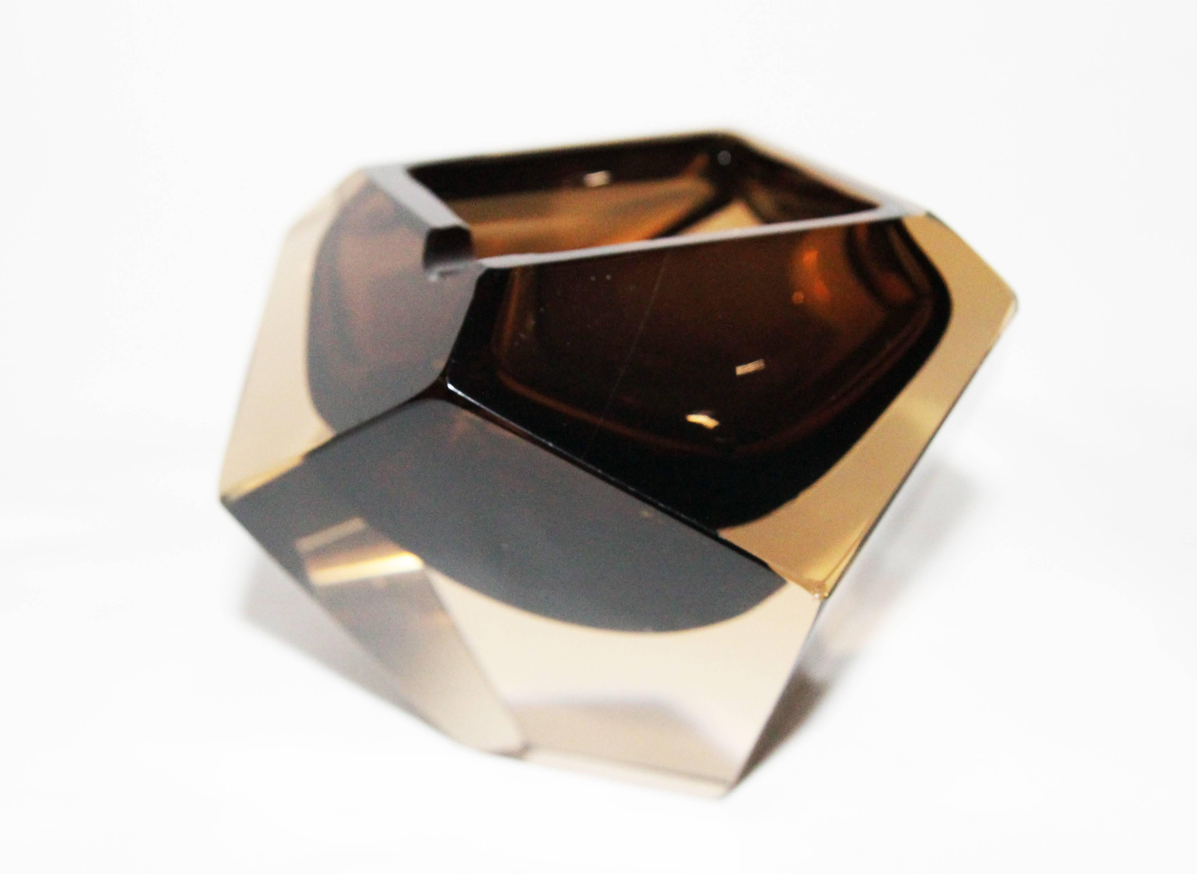 A rare set of a lighter and ashtray. Italian Murano glass, circa 1970. Amber and brown faceted glass. It's flat cut polished top, like a diamond. Fabulous shape and design. Excellent condition. Size: Diameter: 11 cm, 4.3 in, height 8 cm, 3.2 in.