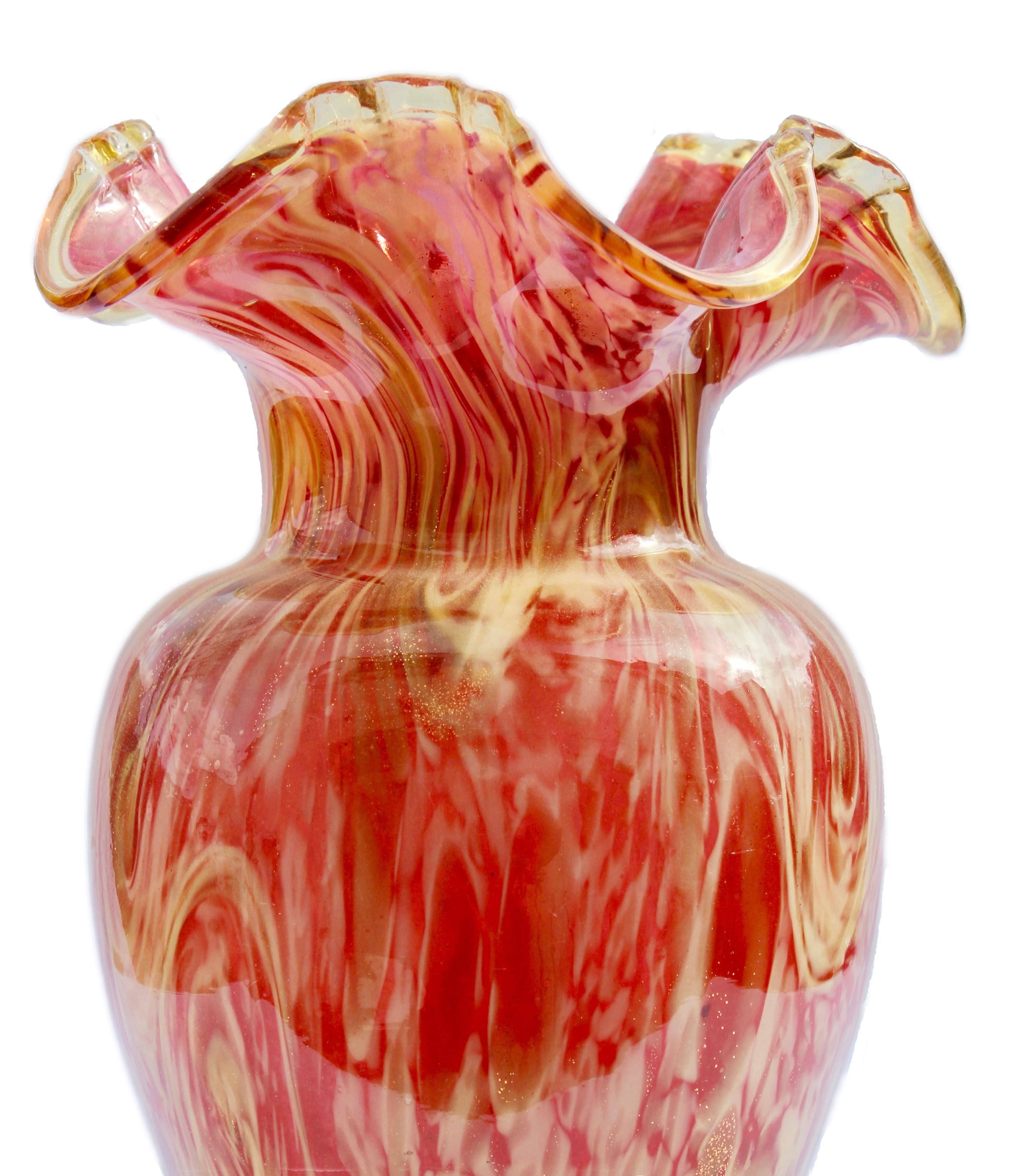 Beautiful Murano vase yellow and pink with gold inclusions.

The piece is in excellent condition and a real beauty!
Please look at our storefront page to browse our entire collection.
  