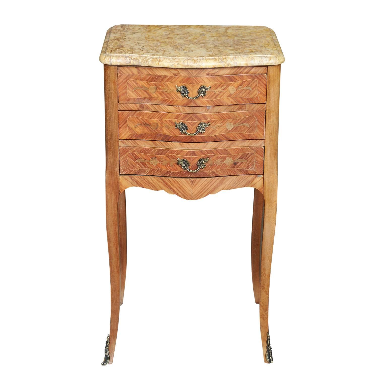 This is a pair of rather charming 19th Century French Louis XVI style inlaid dry walnut night/bedside tables, complete with three drawers and marble tops, circa 1880.