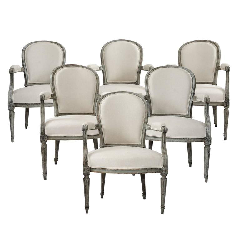 Six Louis XVI Painted Open Armchairs, circa 1780 For Sale
