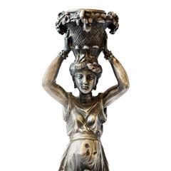 Pair of Silvered and Gilt Bronze Late Empire Candlesticks, circa 1830