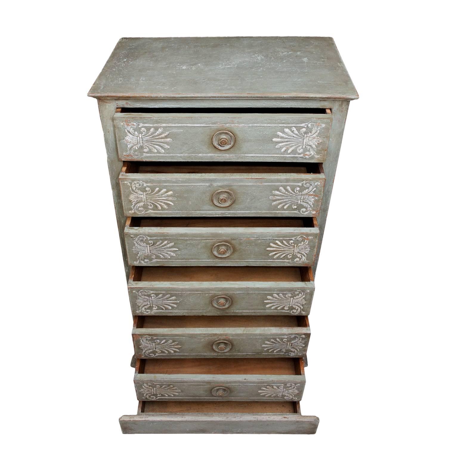 This is a beautiful and wonderfully proportioned French Empire style early 19th Century tall Seven-Drawer Oak commode/chest of drawers. The paintwork has been refreshed, circa 1830.

