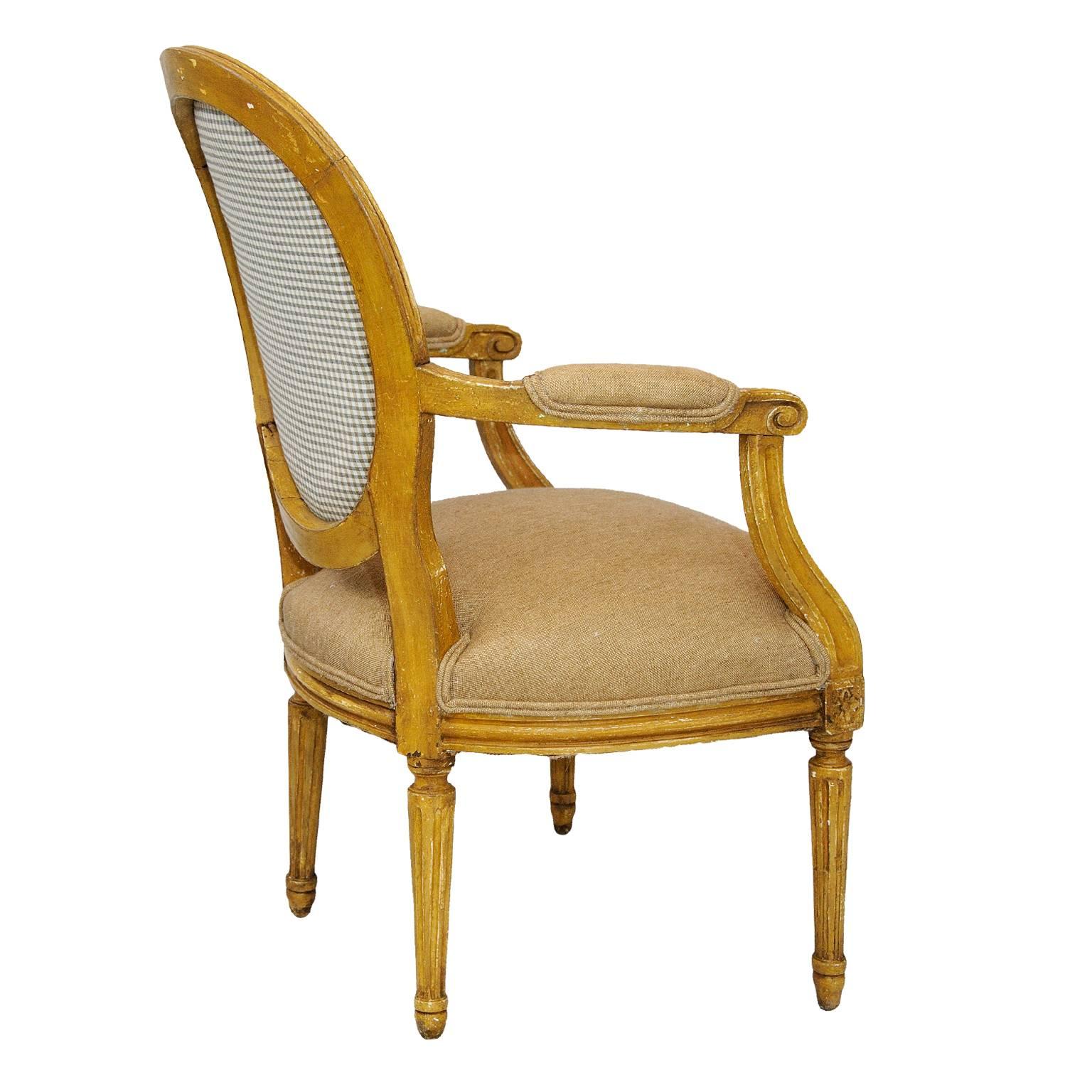 This is a​ lovely pair of French late 18th century neoclassical painted Louis XVI period Open Armchairs, upholstered in a very pleasing oat colored Scottish linen, the paintwork has been refreshed, circa 1780.