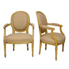 Pair of French Neoclassical Painted Louis XVI Open Armchairs, circa 1780