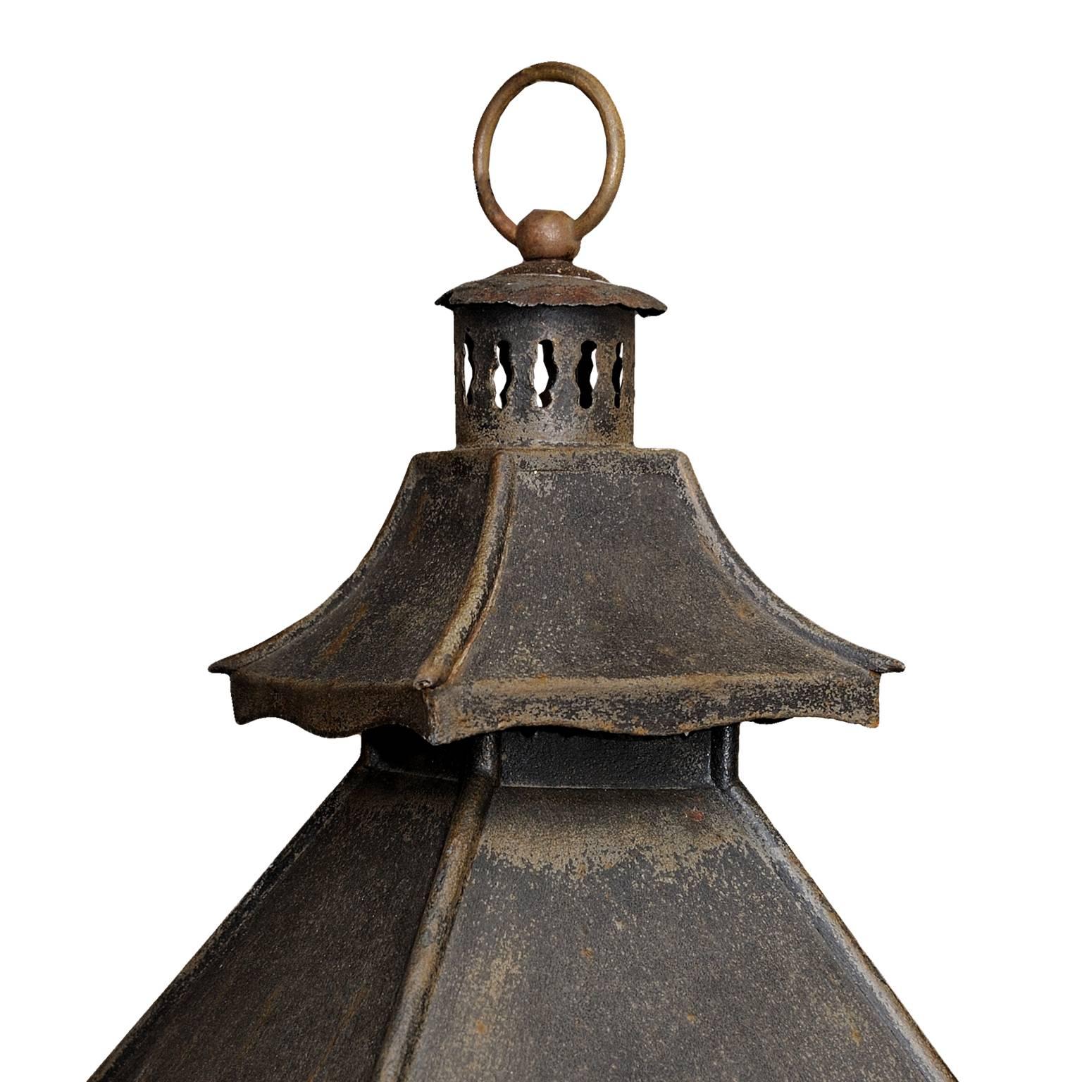 This is a lovely French early 19th century painted Tole hanging hall lantern, now converted to electricity and featuring very attractive finial detail, circa 1840.