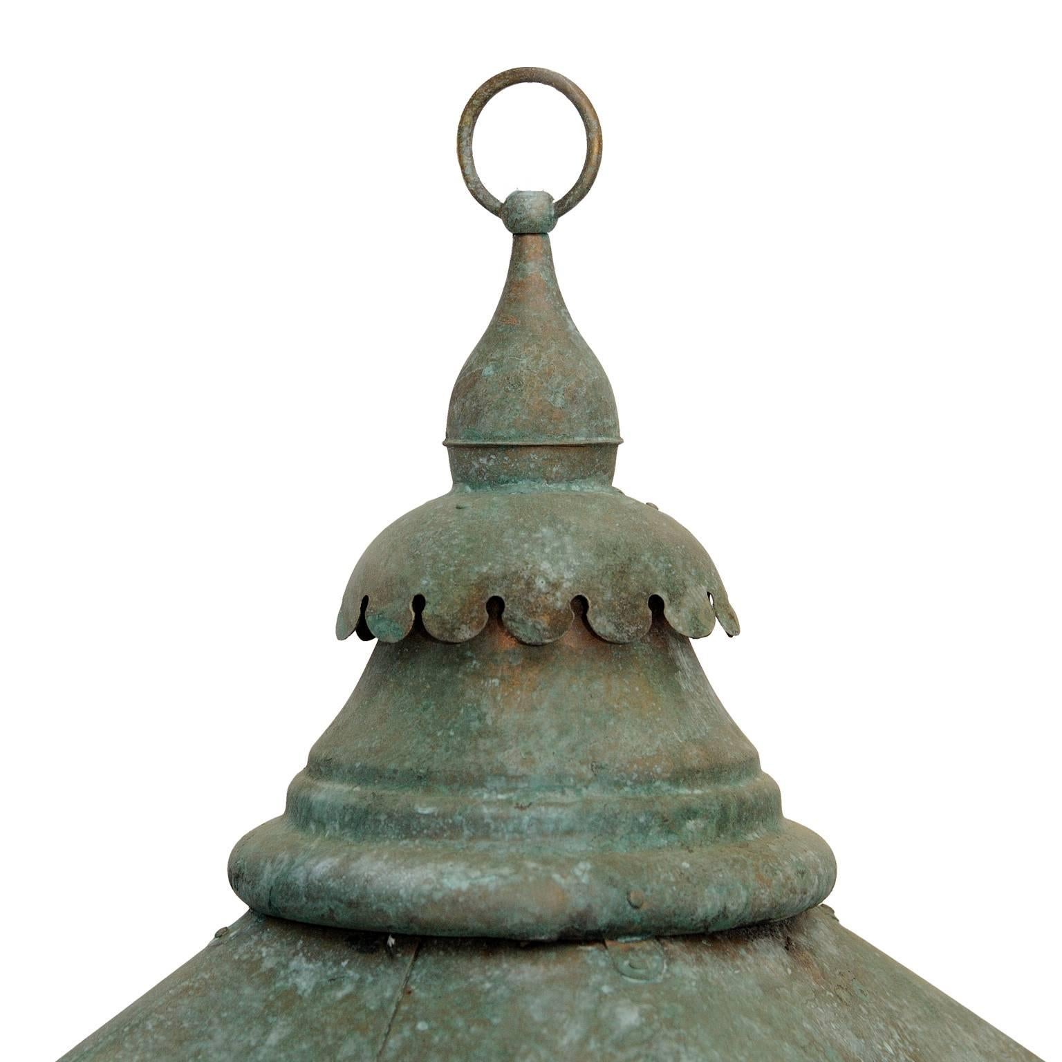 This is a large and very attractive English mid-19th century verdigris copper hanging gas lantern, now converted to electricity and ready to use, suitable for interior or exterior use.

  