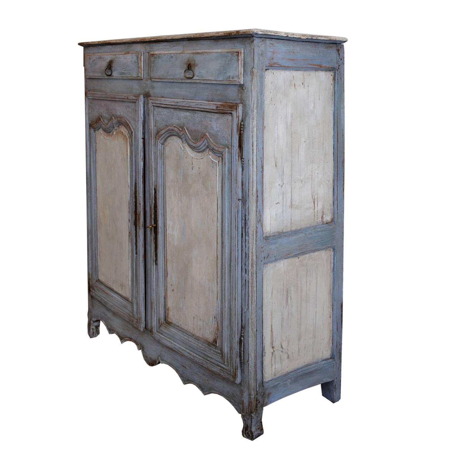 This is a rather lovely mid-18th century Louis XV small painted cupboard armoire of very practical dimensions.

The cupboard has two internal shelves, these can be removed to create a large open cupboard and use the internal brass hanging rail,
