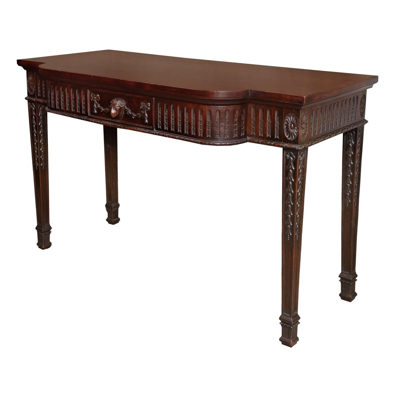 This very smart and beautifully made and finished, late 19th century mahogany serving or side table is attributed to Hicks of Dublin.

It comes complete with a Brass London retailers Label for Druce &Co, Baker Street, London NW, Second Hand