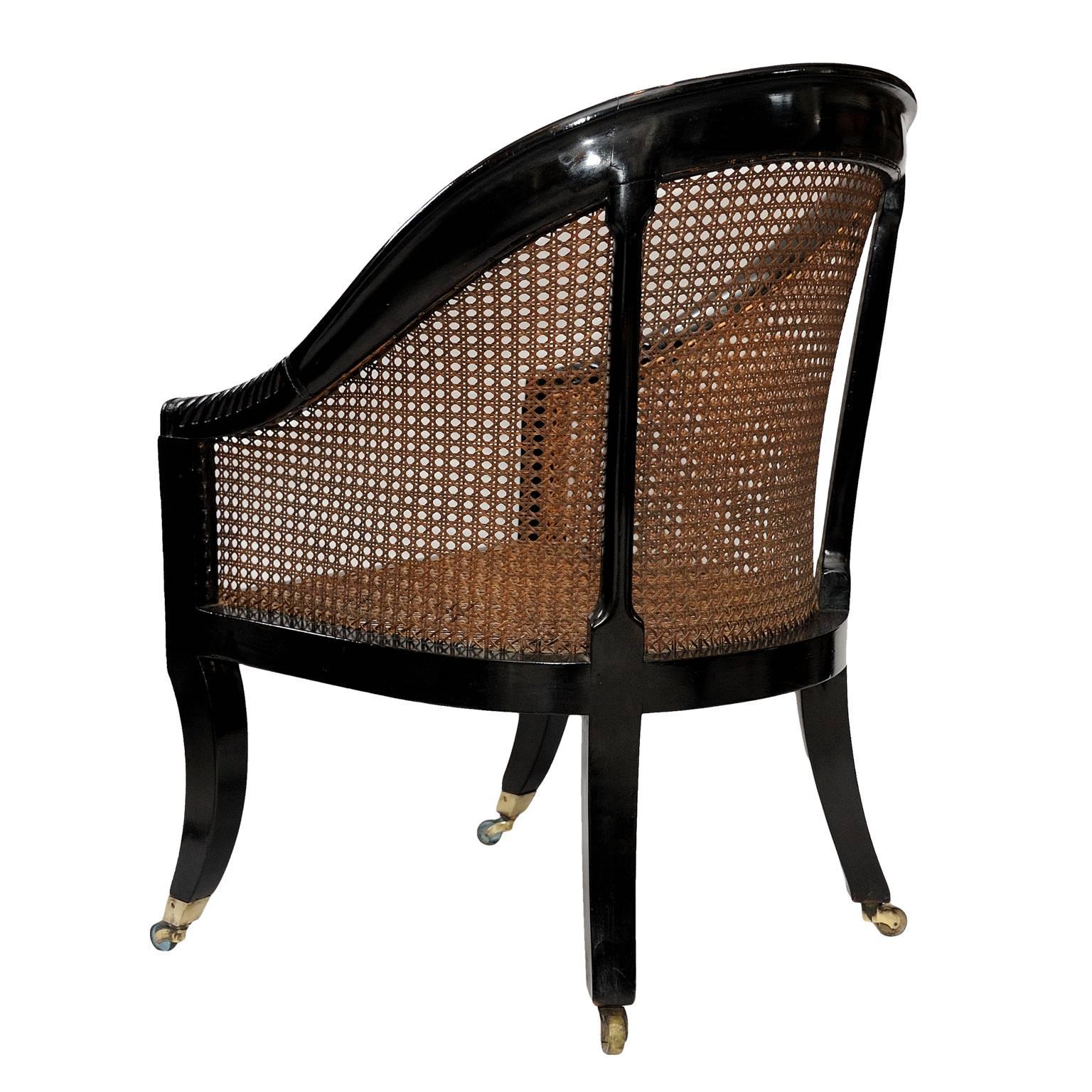 Caning English Early 19th Century Regency Ebonized Library Chair, circa 1810 For Sale