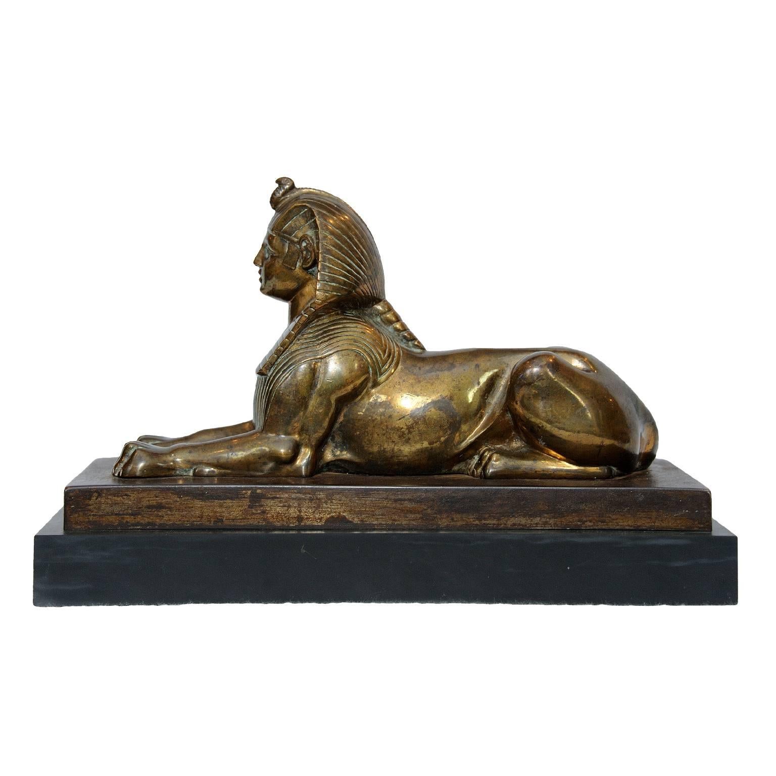 Polished English Early 19th Century Regency Period Bronze Sphinx, circa 1820 For Sale