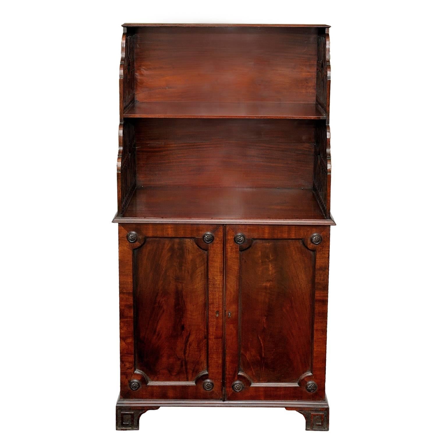 This is a fine example of an English late 18th century George III mahogany Side Cabinet, with fretted shelves above and felt covered interior cabinet shelves, circa 1780.

A lovely piece of very useful proportions.
 