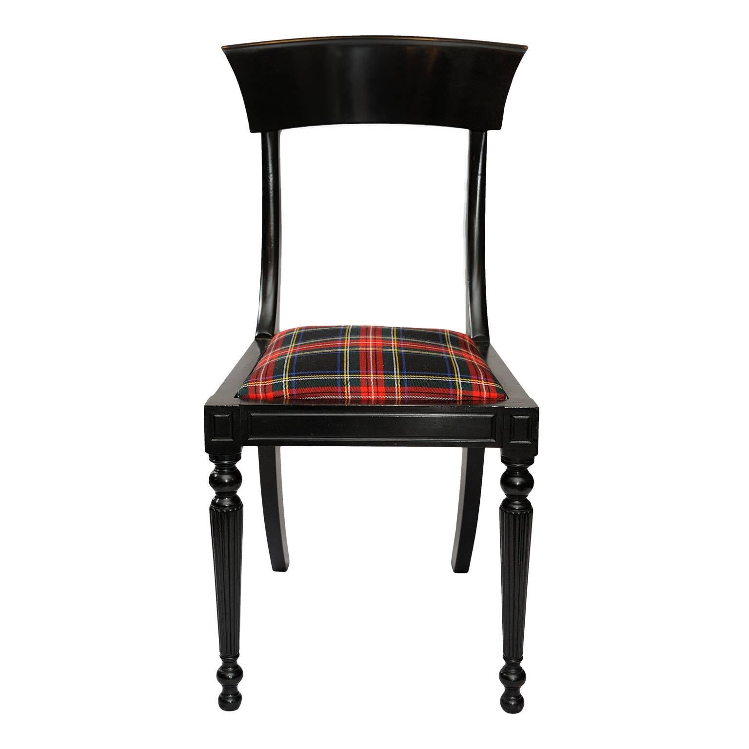 This is a very smart set of four stylish French early 19th Century ebonised Side Chairs with drop in seats, now upholstered in tartan fabric, circa 1830.