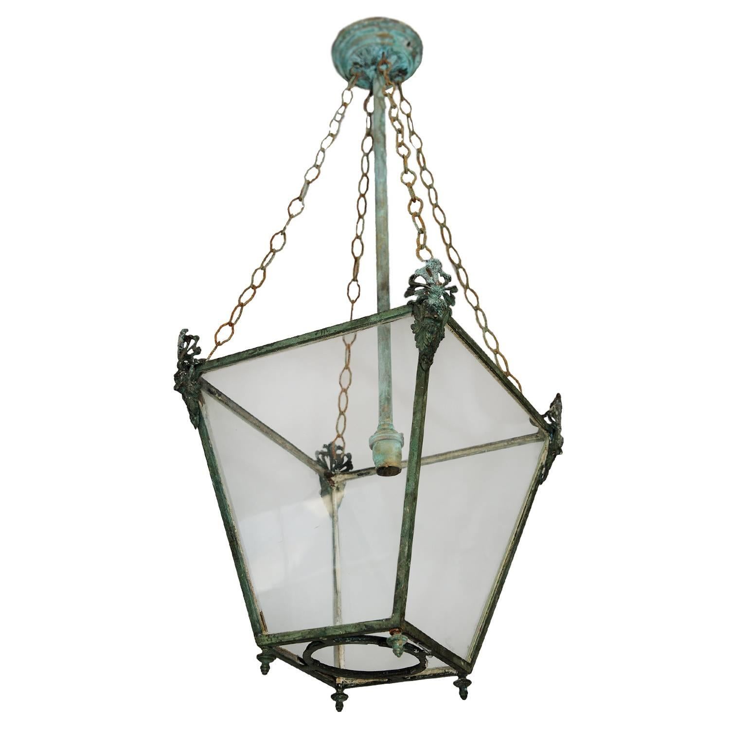 This is a rather beautiful English Regency verdigris bronze hanging lantern, made to a design by 'Tatham', circa 1810. 

The lantern has been re-wired and is ready to hang.