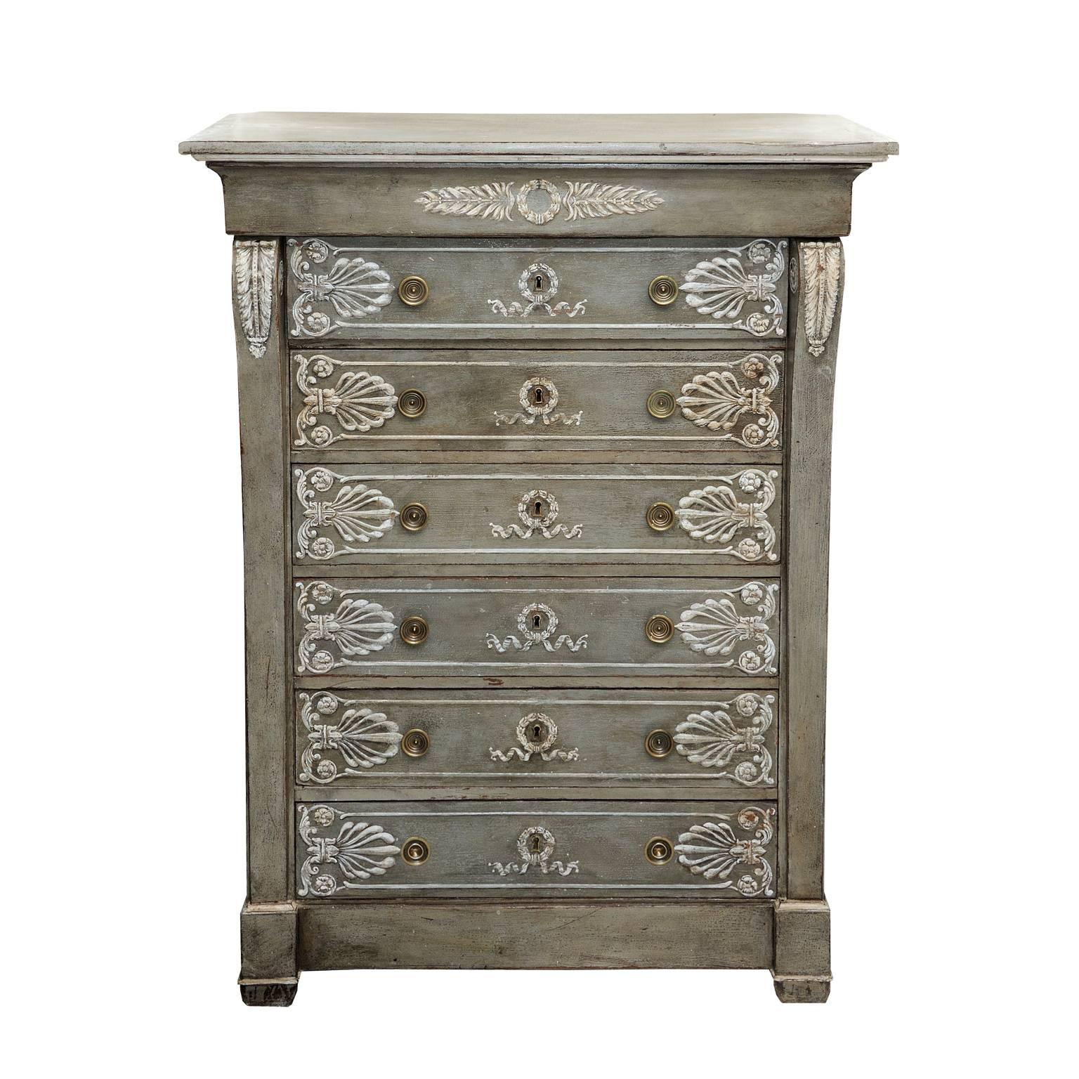 This is a rather stylish tall French early 19th century Empire period grey painted seven-drawer commode or chest of drawers (also known as a semainier). Featuring seven opening drawers and beautiful white and grey painted decoration, fitted with