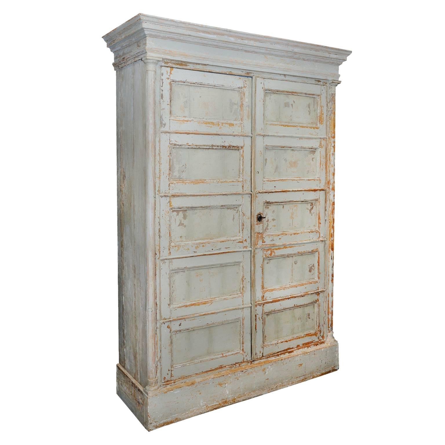 French Directoire dry-scraped painted cupboard, circa 1790.