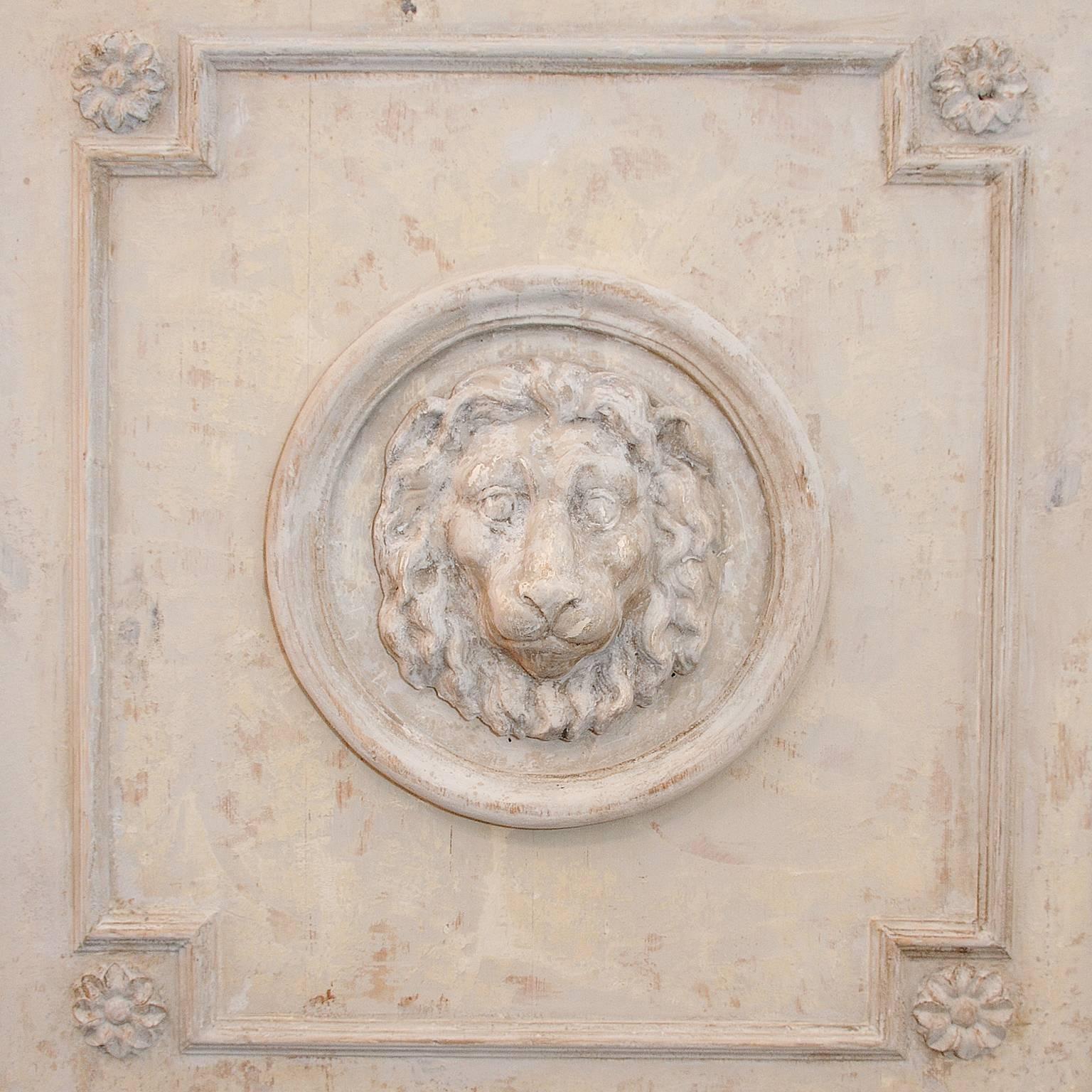 This is a very attractive large 18th century French neoclassical trumeau mirror with wonderful central lion mask design and columns to the sides, retaining its original mirror glass.

Dry scrapped back to its original old white paint finish, circa