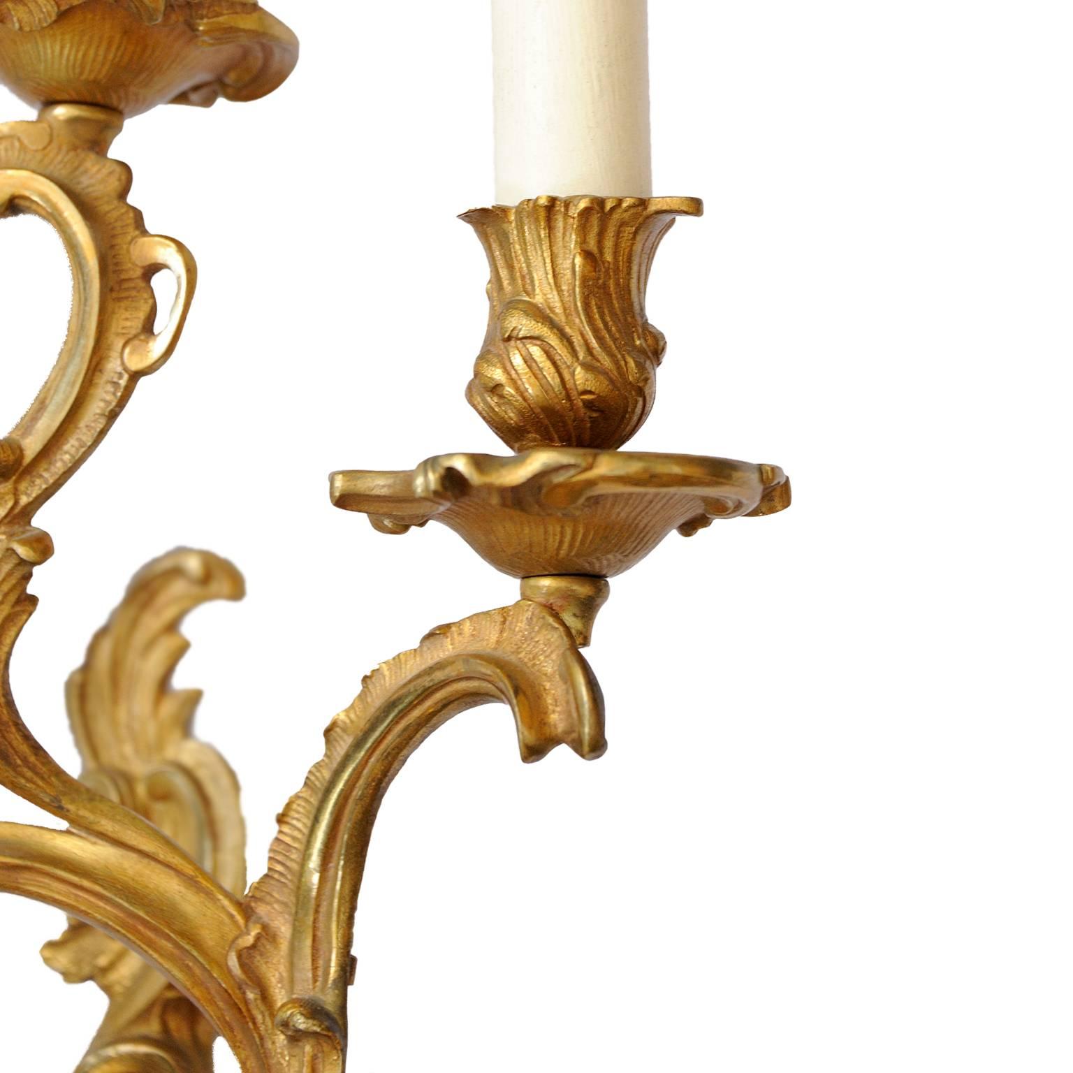 French Pair of Louis XV Style 19th Century Rococo Gilt Brass Wall Lights, circa 1890