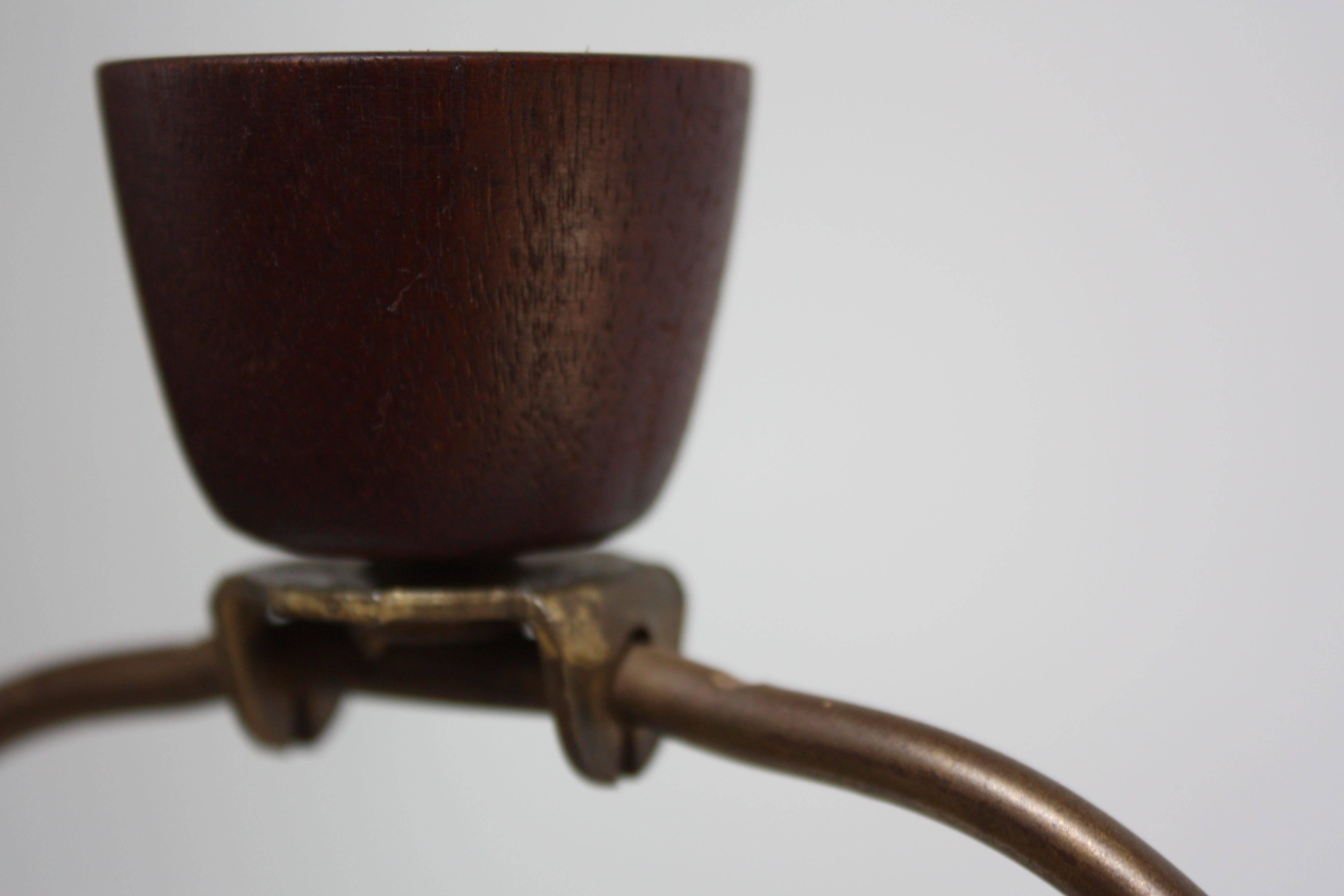 This ceramic gourd-shaped lamp (model #M200-51-33-6) was designed by Gordon and Jane Martz for Marshall Studios in the 1960s. It features a pale grey matte glaze body offset by 'bands' of color (sky blue, sand / beige tones, and a light olive