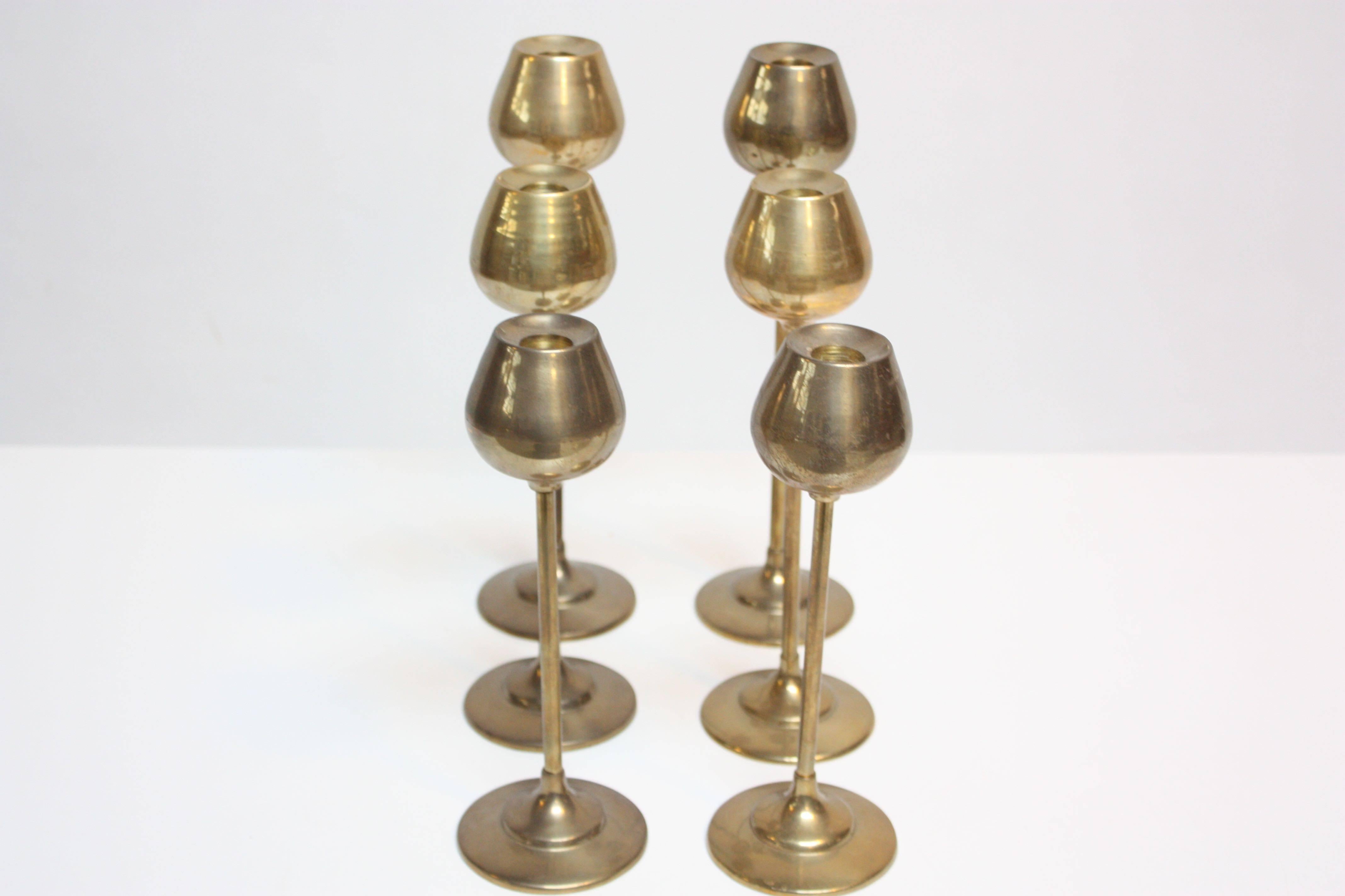 Circa 1960s Rosenthal Netter solid brass candlesticks. Age-commensurate wear / patina present; unpolished, original condition. All dimensions are the same except height:
Tall: 11.5