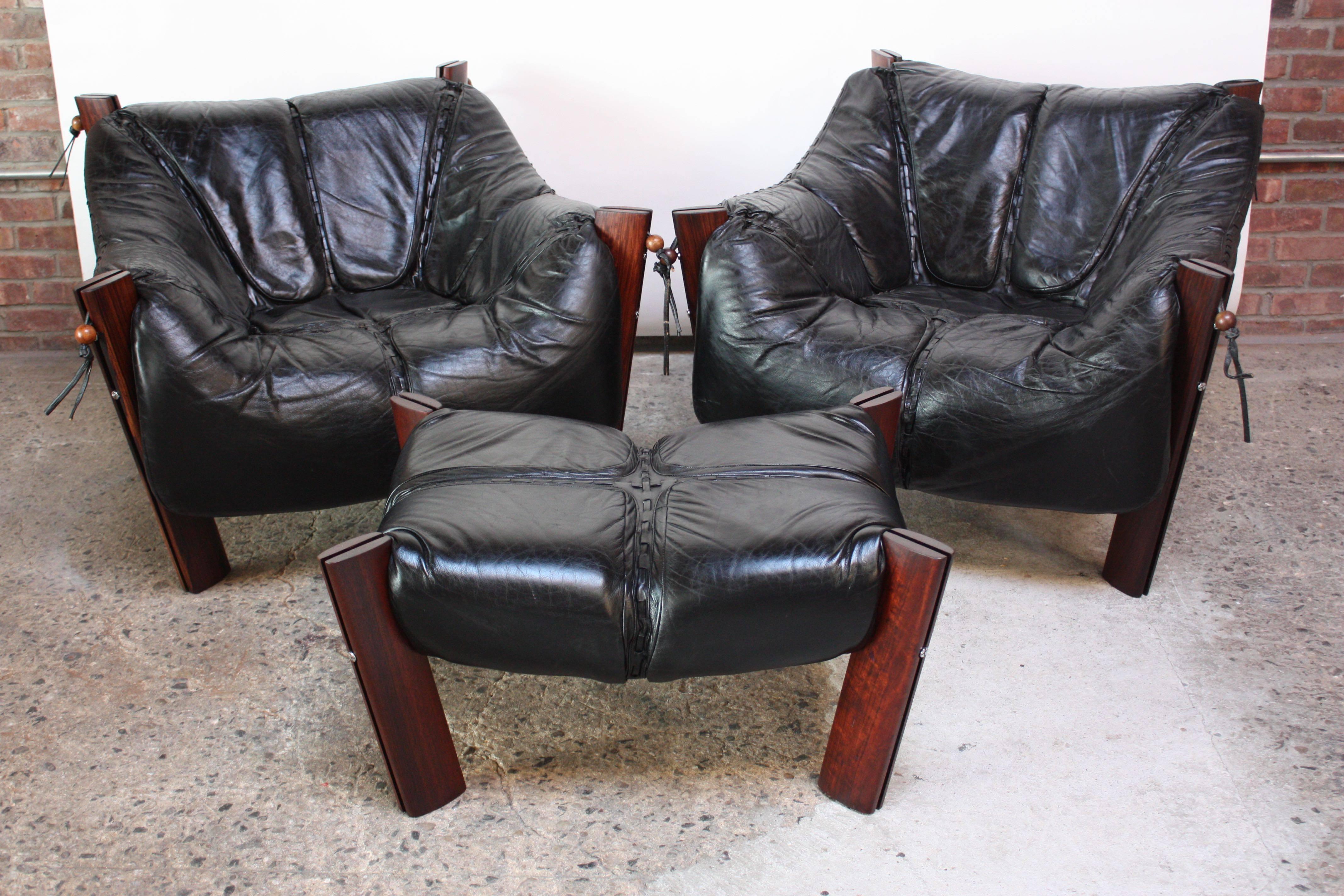 Mid-Century Modern Pair of Jacaranda and Leather Lounge Chairs and Ottoman by Percival Lafer