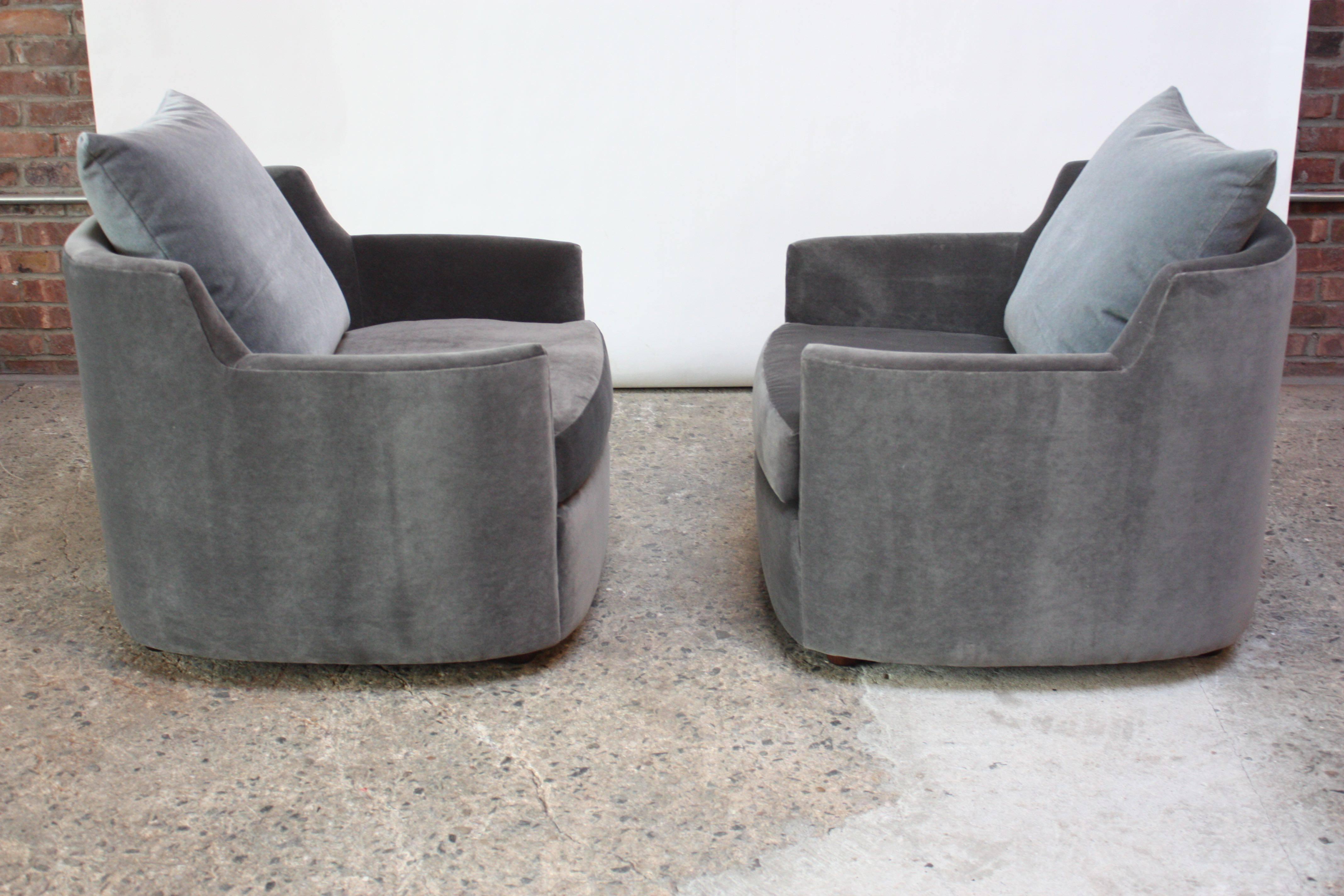 Pair of Barrel-back chairs composed of 'block' stained mahogany feet and newly upholstered frame in Kravet 'gun-metal gray' velvet with a pale blue mohair back cushion (originally, the chairs did not have a back cushion; we had these made for these