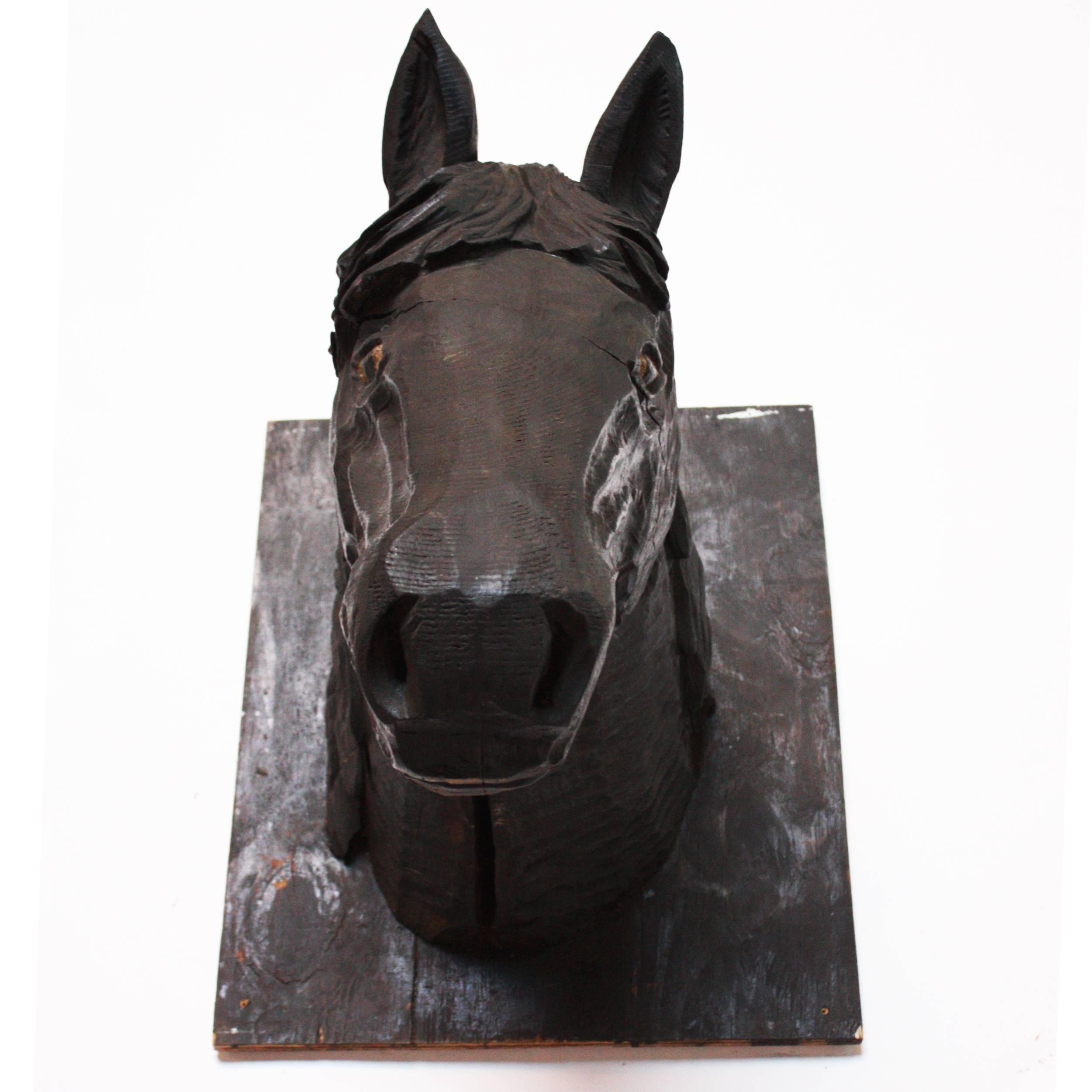 This interesting hand-carved horse advertising piece was commissioned sometime in the mid-20th century for a New England dining establishment. However, and for reasons unknown to us, the business never opened and, as a result, this folk relic ended