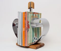 Revistero extensible de estilo Art Déco en cromo y nogal, diseñado por Fred D. Farr para Revere