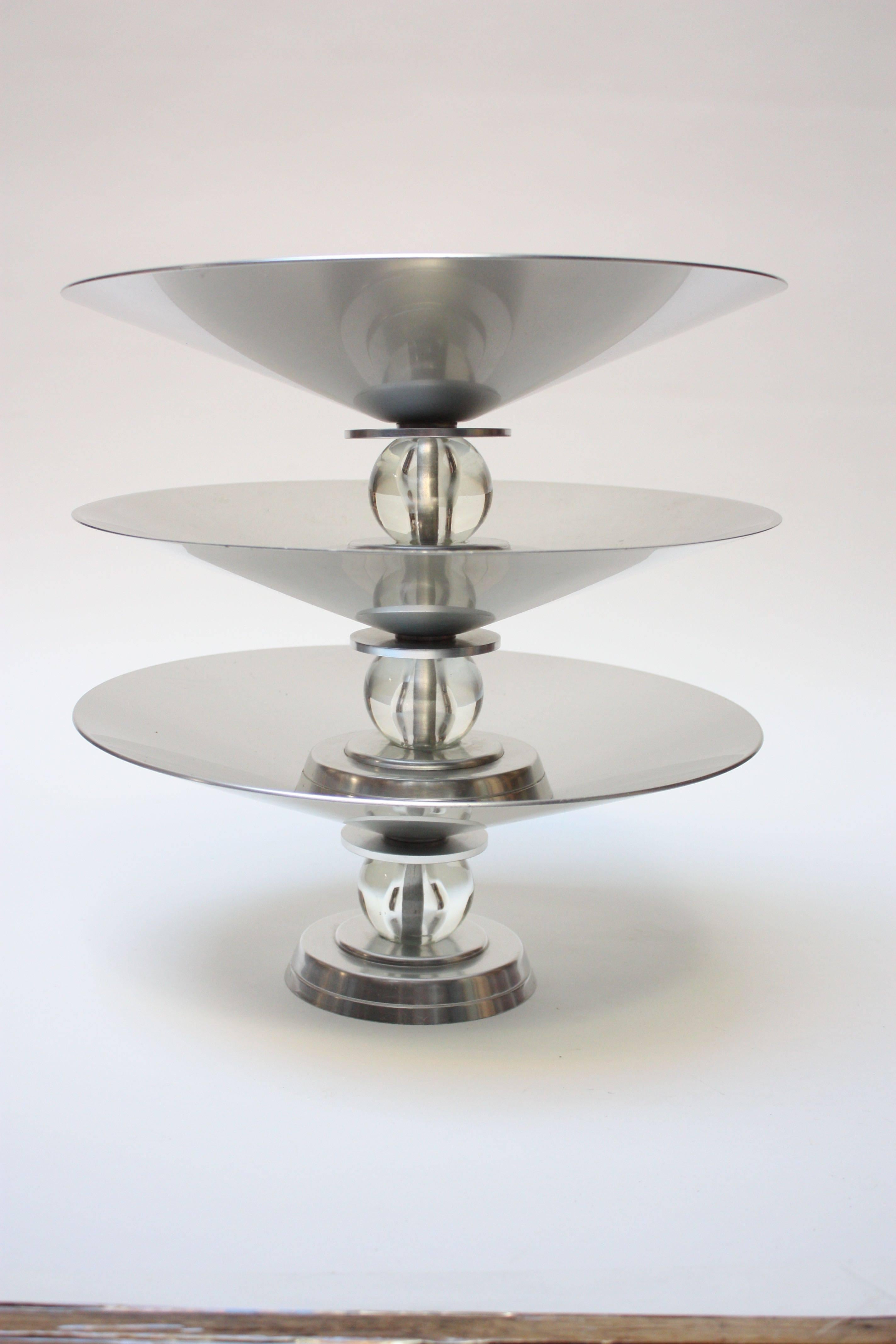 Nice set of three Art Deco aluminum compotes from the 'Stratford' series (Model 7411), conceived and designed by Lurelle Guild for Kensington in 1934. Only in production until the end of WWII. Aluminum foot and top are separated by a glass 'orb'
