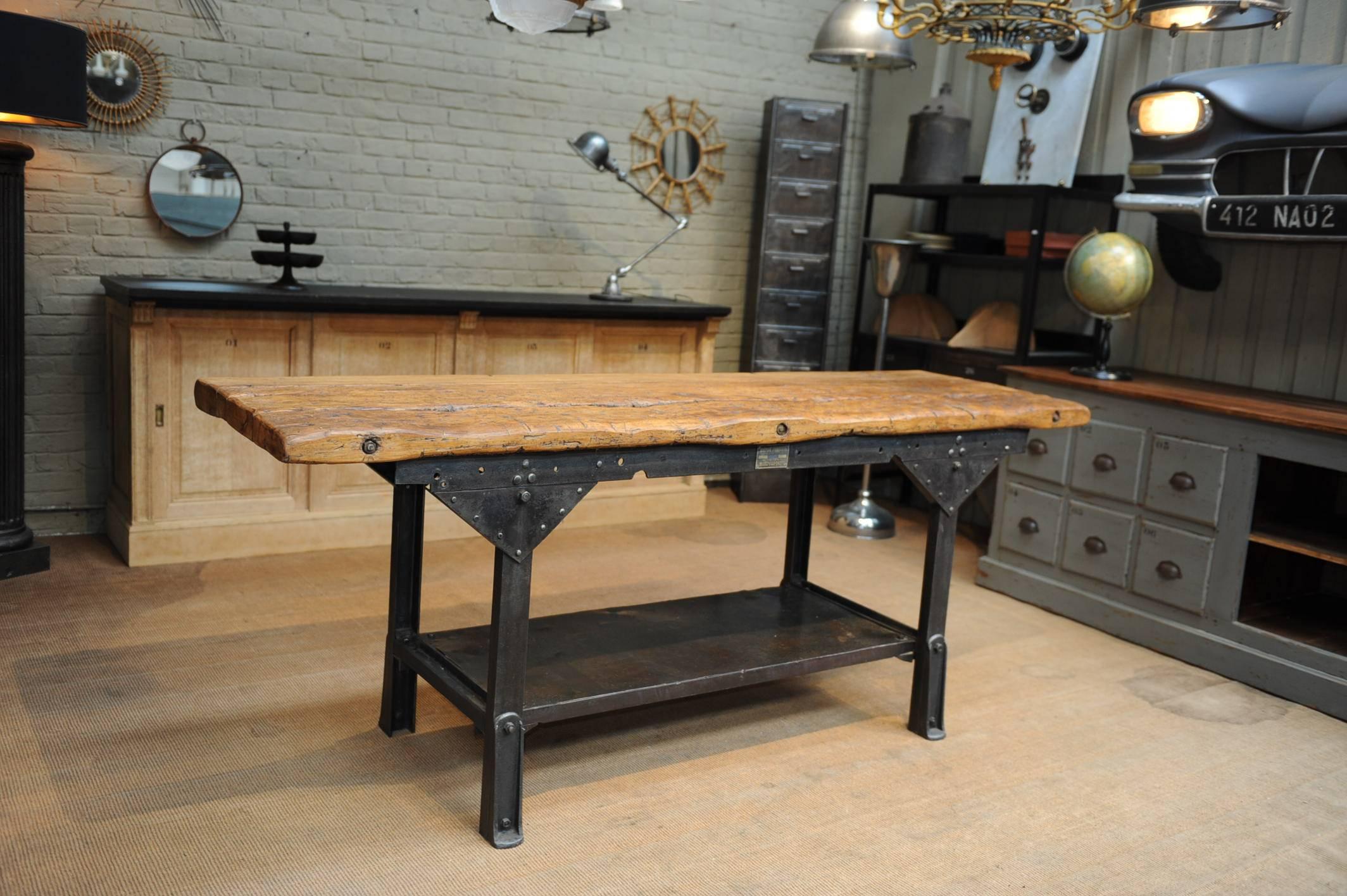 Riveted iron French factory two-tier console work table, hand polished finish with original waxed top, circa 1920.