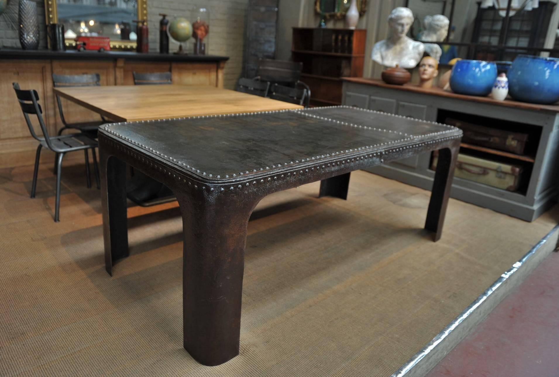 French factory old riveted iron trunk cut in Industrial dining table,
circa 1890. Weight 110 kg. Hand polished finish.