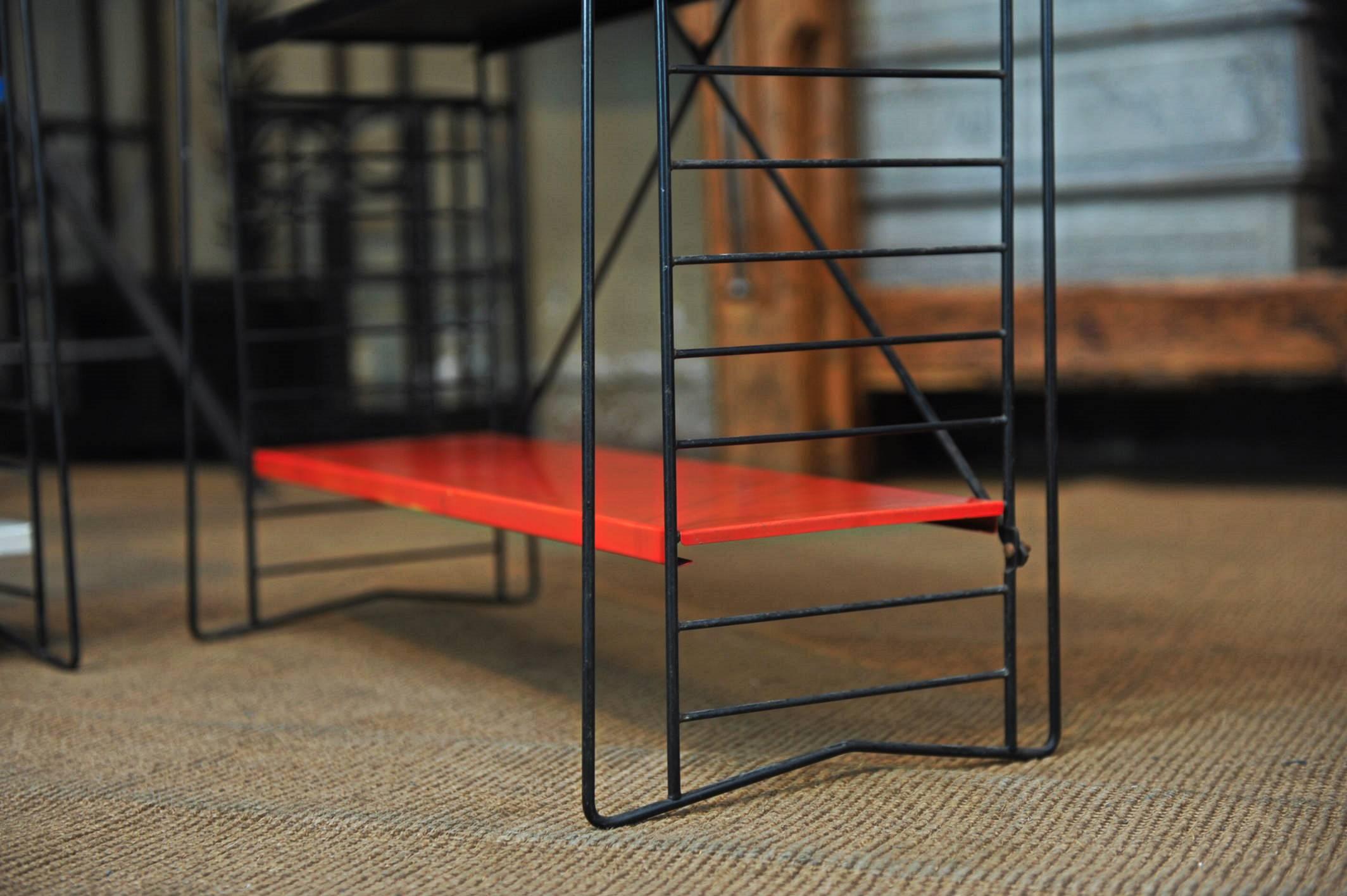 Mid-20th Century Pair of Tomado Multi-Color Metal Standing Book Shelves
