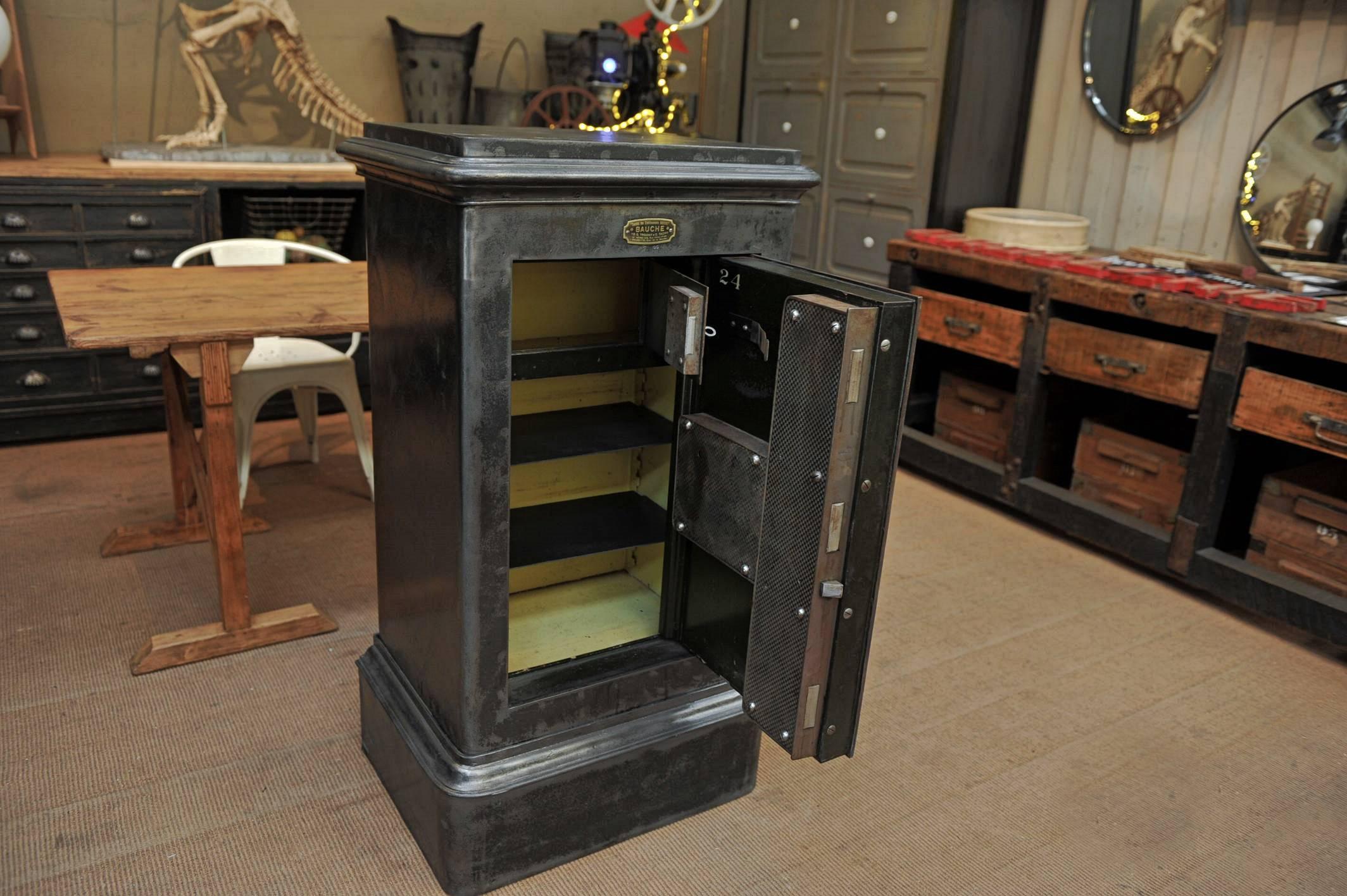 Iron safe cabinet by Bauche with original three keys and original instruction manual, circa 1910.Polished and varnished finish.
 