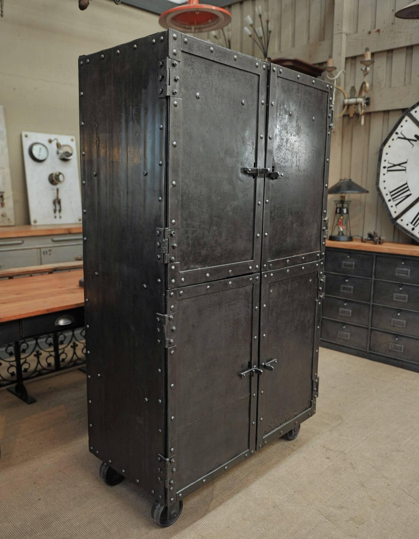 Exceptional Four-Doors Industrial Riveted Iron Cabinet on Wheels, circa 1900 4